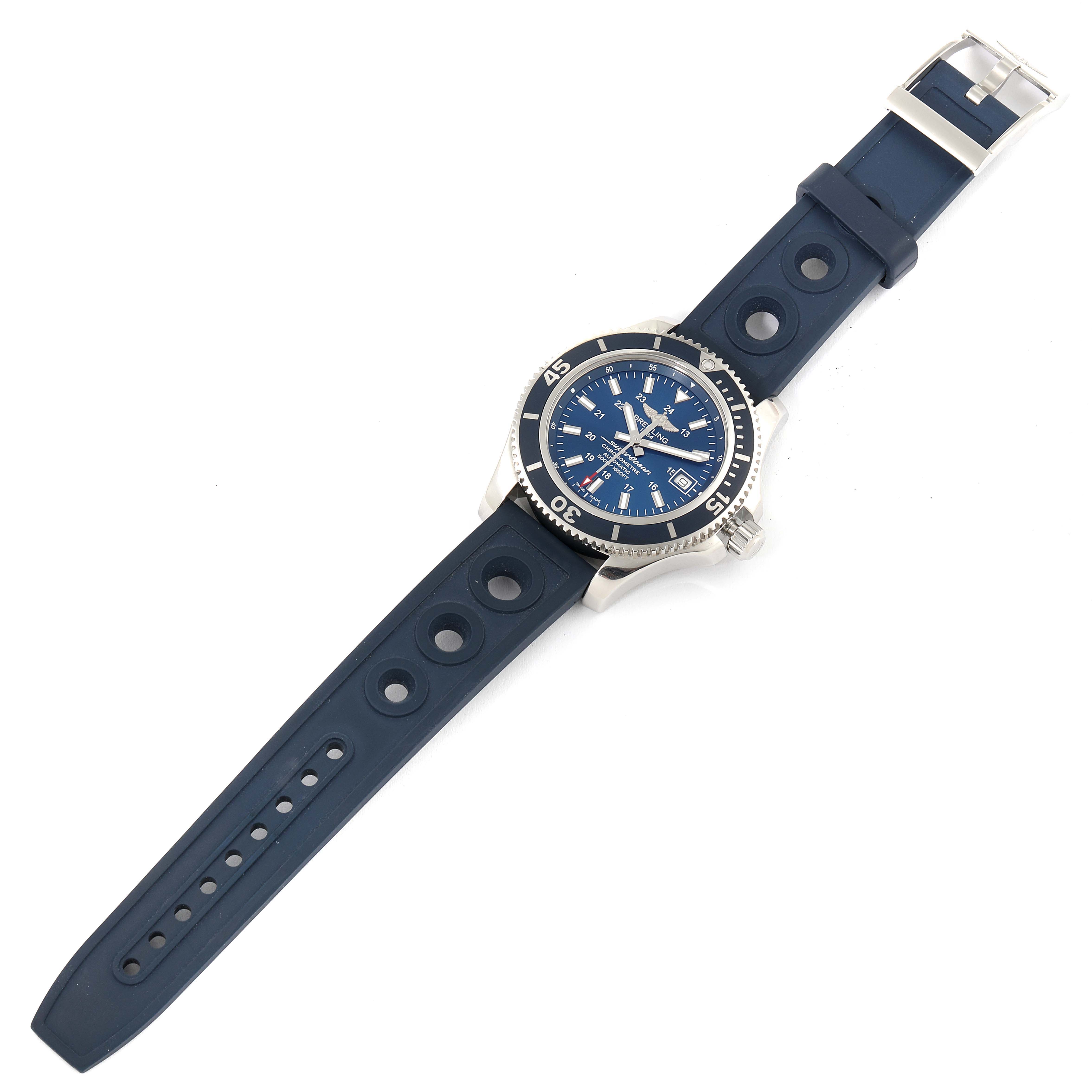 This image shows a top-down view of a Breitling Superocean A17365 Men's Stainless Steel Blue Dial A17365 Men's Stainless Steel Blue Dial watch with a blue strap and silver bezel.