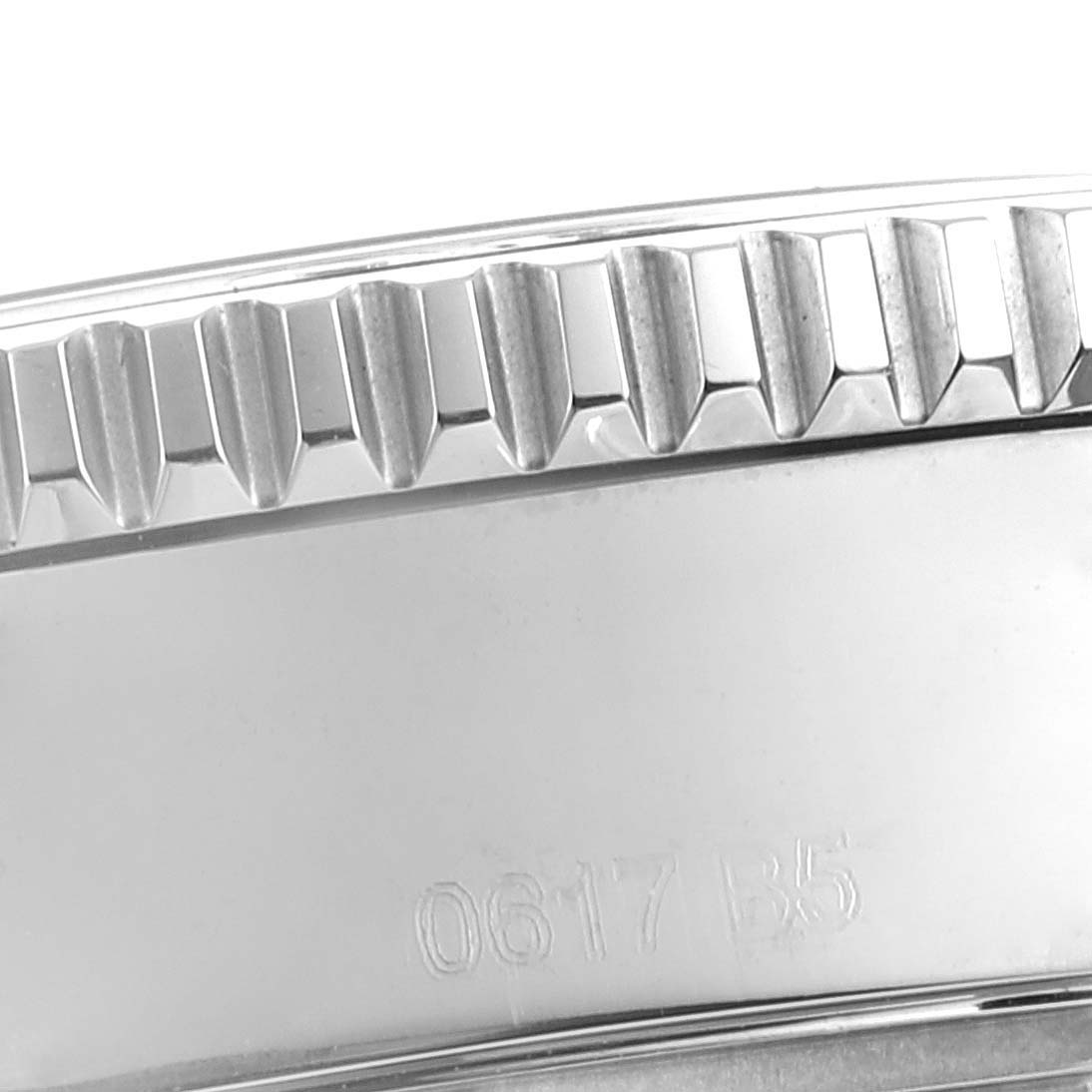 The image shows a close-up of the bezel and serial number on a Breitling Superocean A17365 Men's Stainless Steel Blue Dial A17365 Men's Stainless Steel Blue Dial watch, viewed from a side angle.