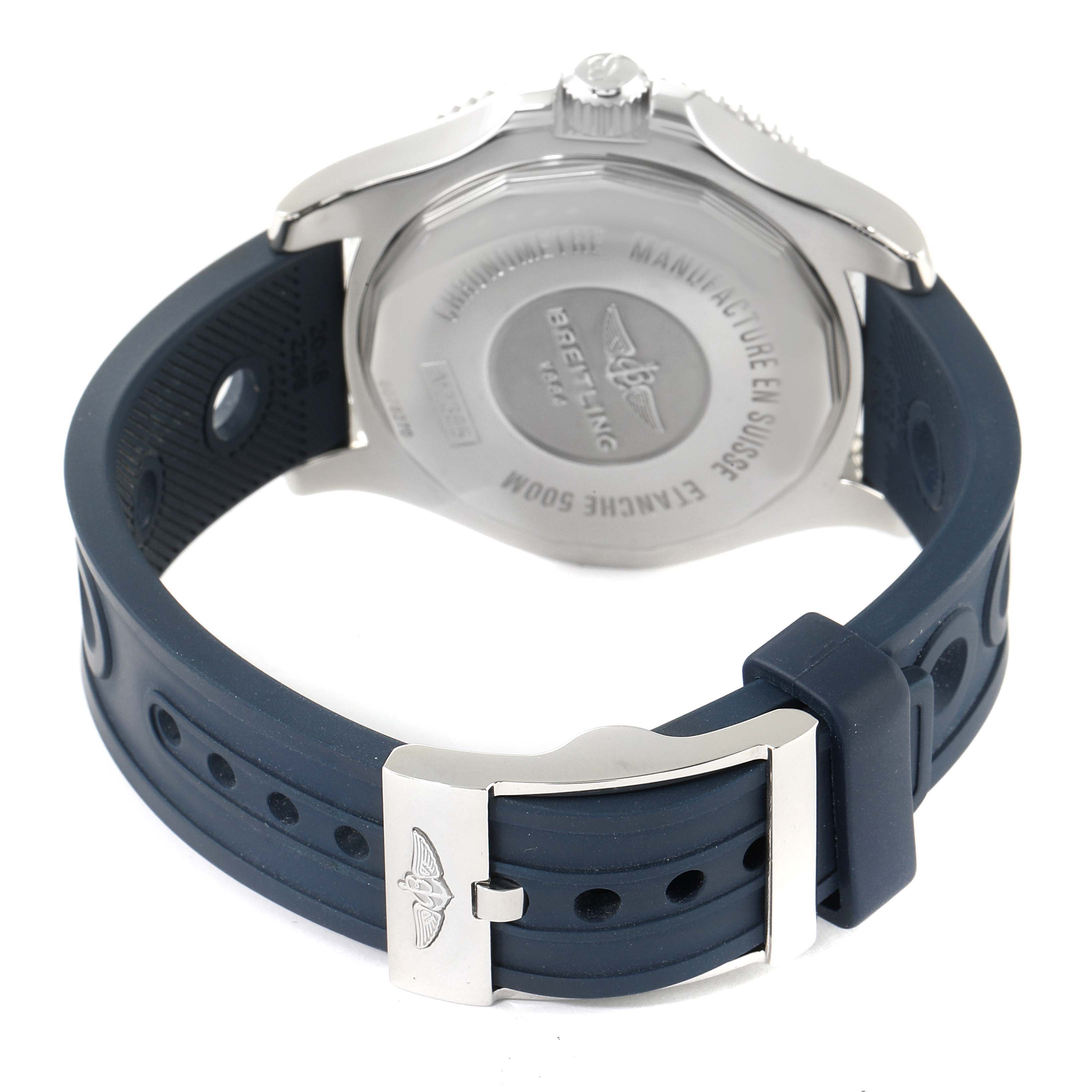 This image shows the back view of a Breitling Superocean A17365 Men's Stainless Steel Blue Dial A17365 Men's Stainless Steel Blue Dial watch, highlighting the case back, crown, and blue rubber strap with a clasp.