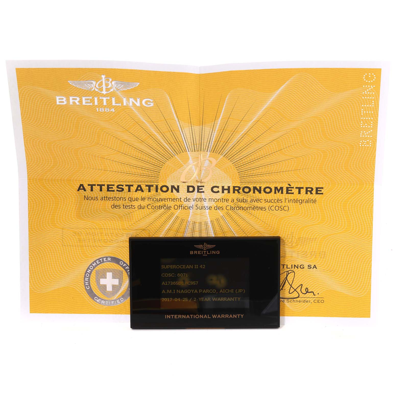 The image shows the international warranty card and chronometer certificate for a Breitling Superocean A17365 Men's Stainless Steel Blue Dial A17365 Men's Stainless Steel Blue Dial model.