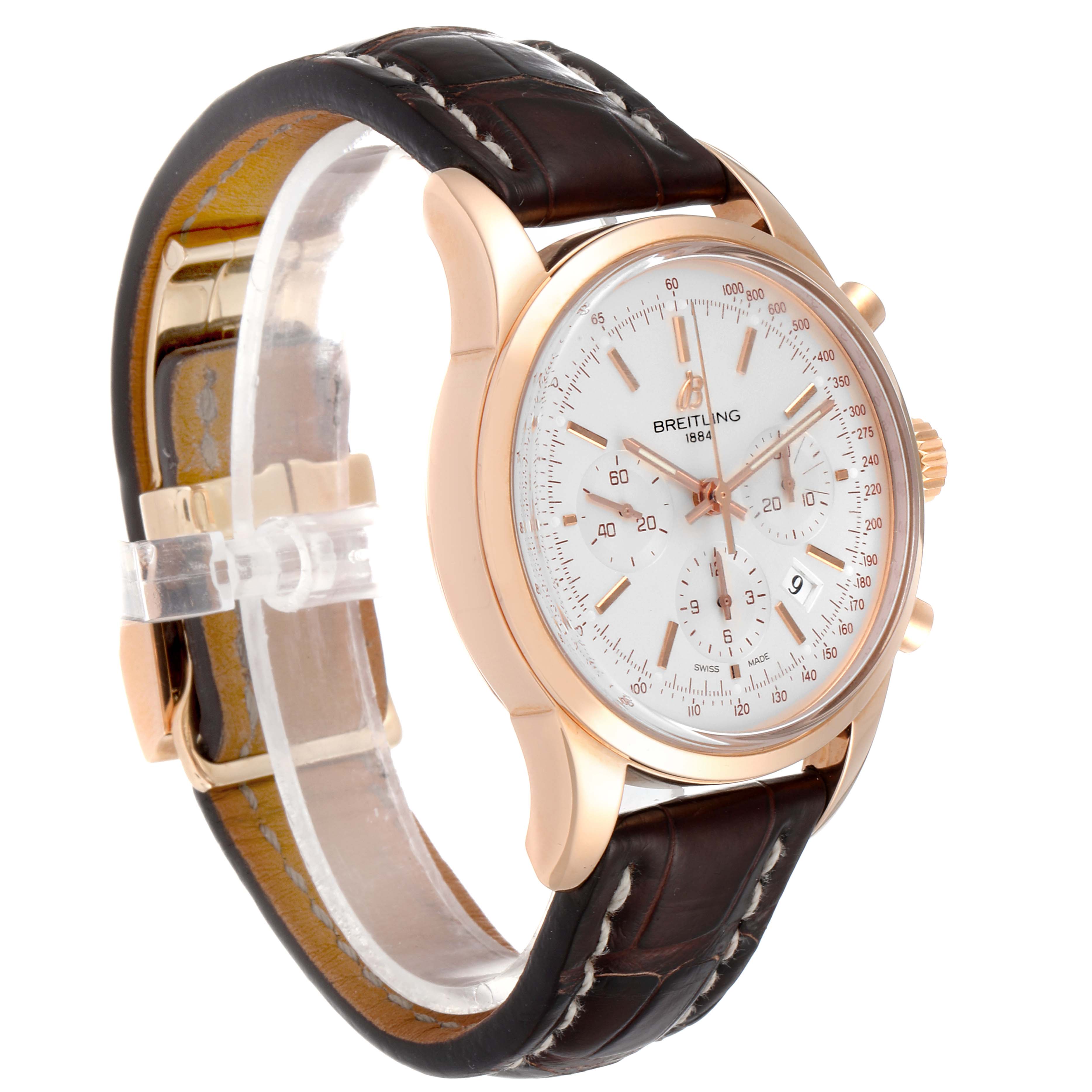 This Breitling Transocean RB0152 Men
s Rose Gold Silver Dial RB0152 Men
s Rose Gold Silver Dial watch is shown from a three-quarter angle, highlighting its face, strap, and clasp.