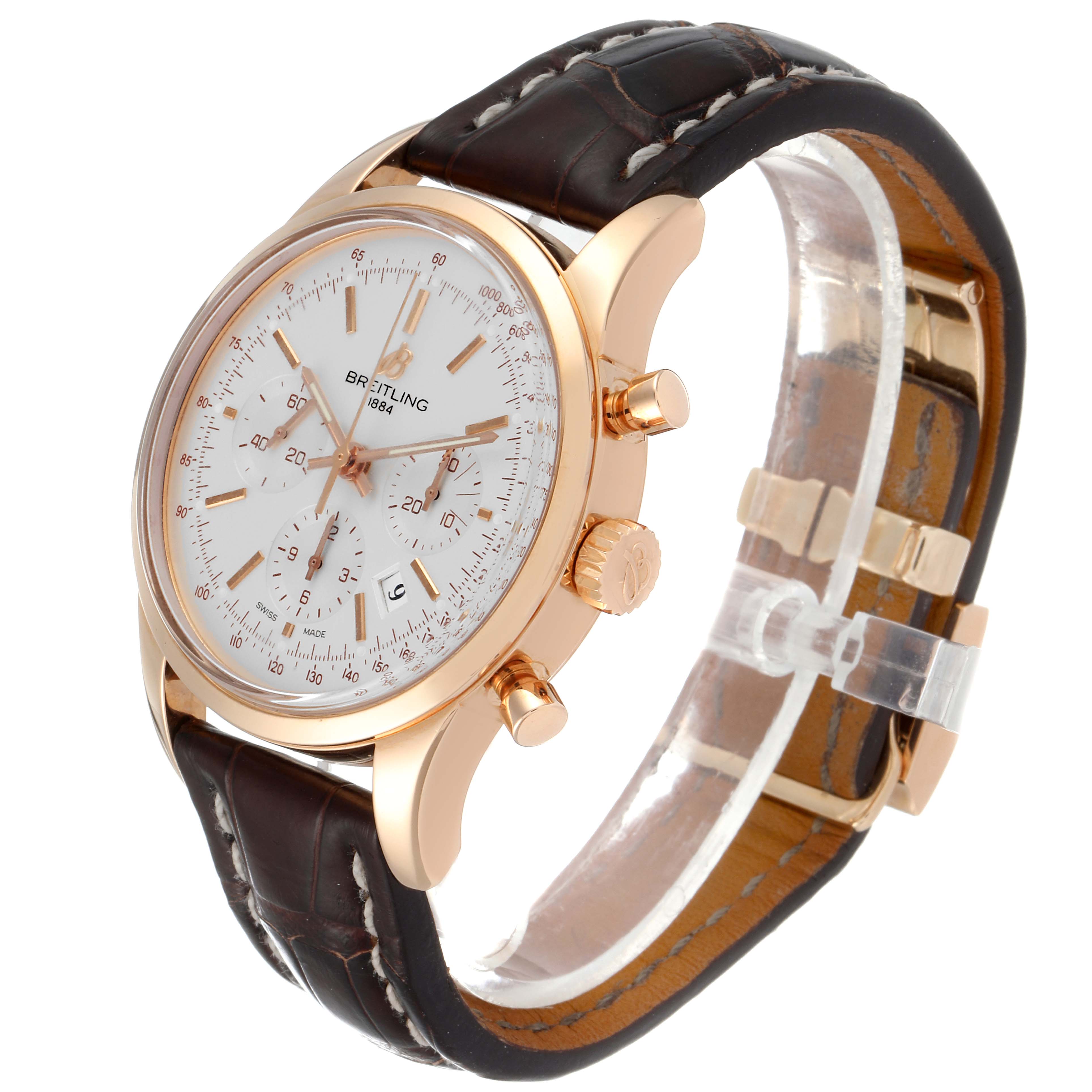 The Breitling Transocean RB0152 Men
s Rose Gold Silver Dial RB0152 Men
s Rose Gold Silver Dial watch is angled to show the front face, side push-buttons, crown, and leather strap.