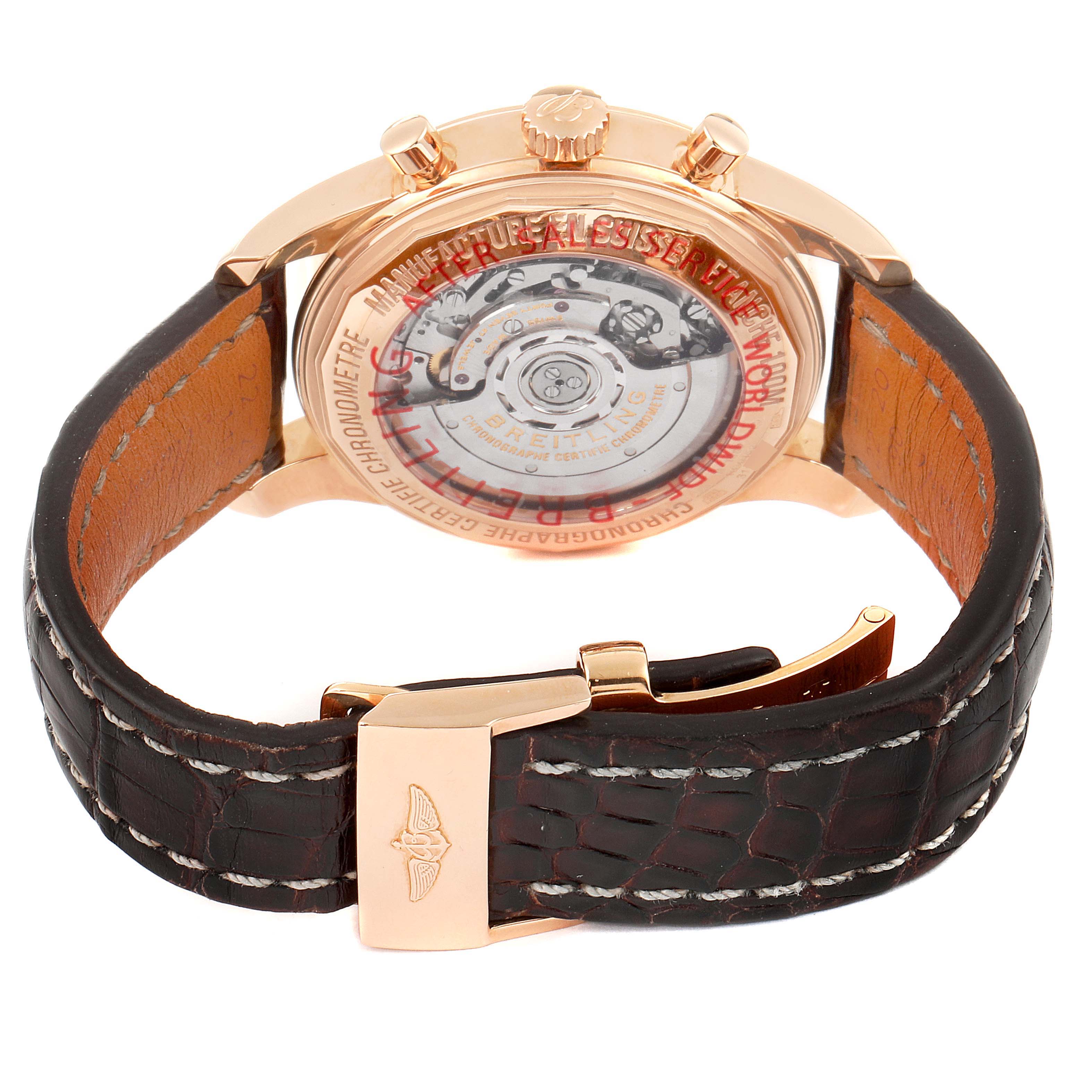 The image shows the back of a Breitling Transocean RB0152 Men
s Rose Gold Silver Dial RB0152 Men
s Rose Gold Silver Dial watch, highlighting the movement and leather strap.