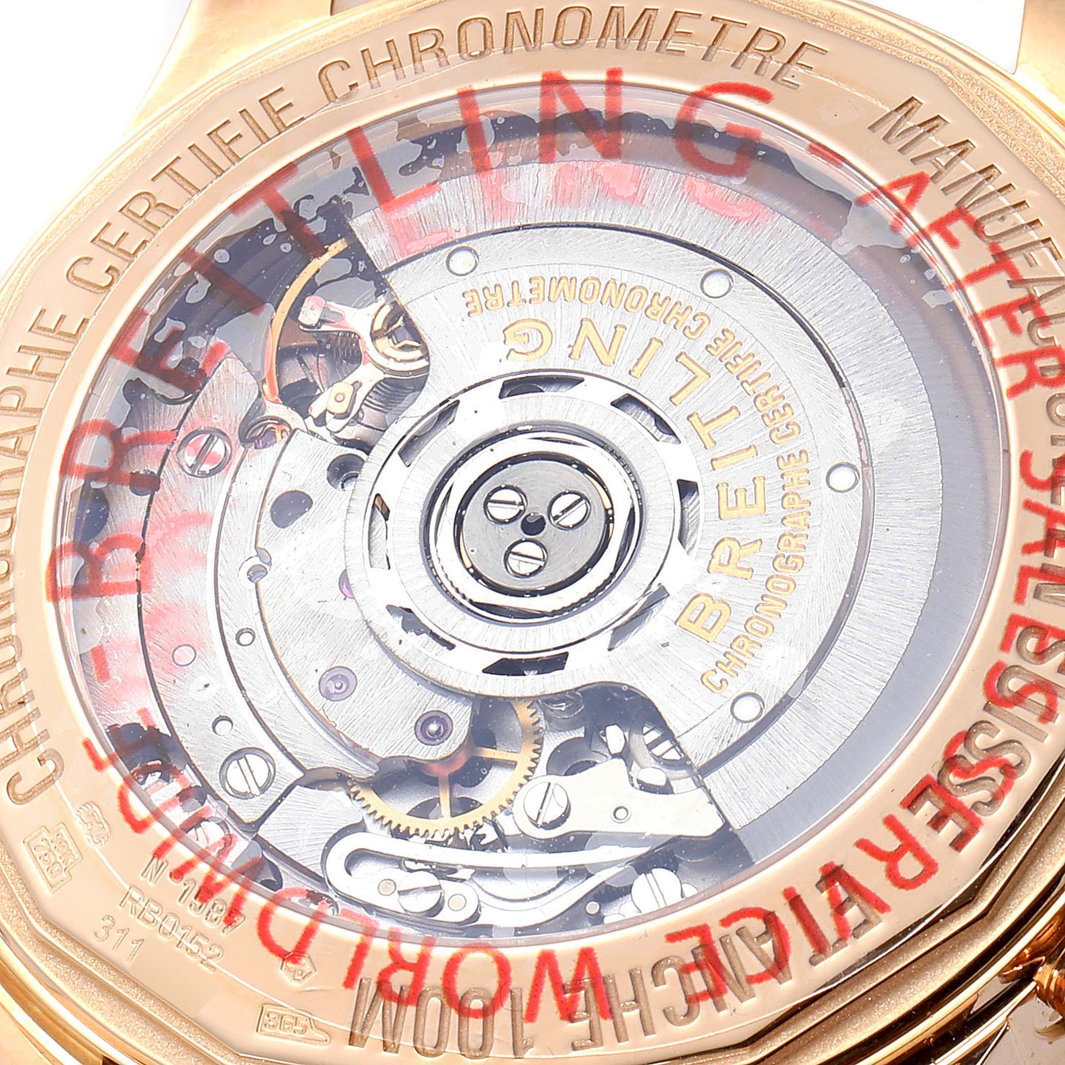 The image shows the back view of the Breitling Transocean RB0152 Men
s Rose Gold Silver Dial RB0152 Men
s Rose Gold Silver Dial watch, highlighting its internal mechanisms.