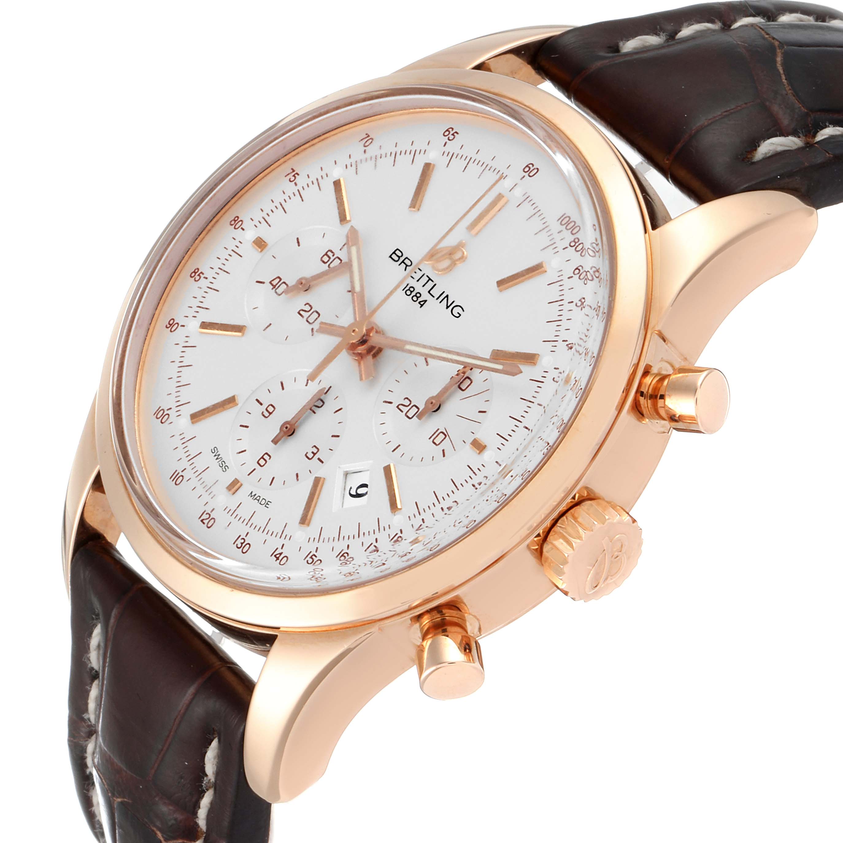 The image shows a side angle view of the Breitling Transocean RB0152 Men
s Rose Gold Silver Dial RB0152 Men
s Rose Gold Silver Dial watch, featuring the dial, crown, pushers, and leather strap.