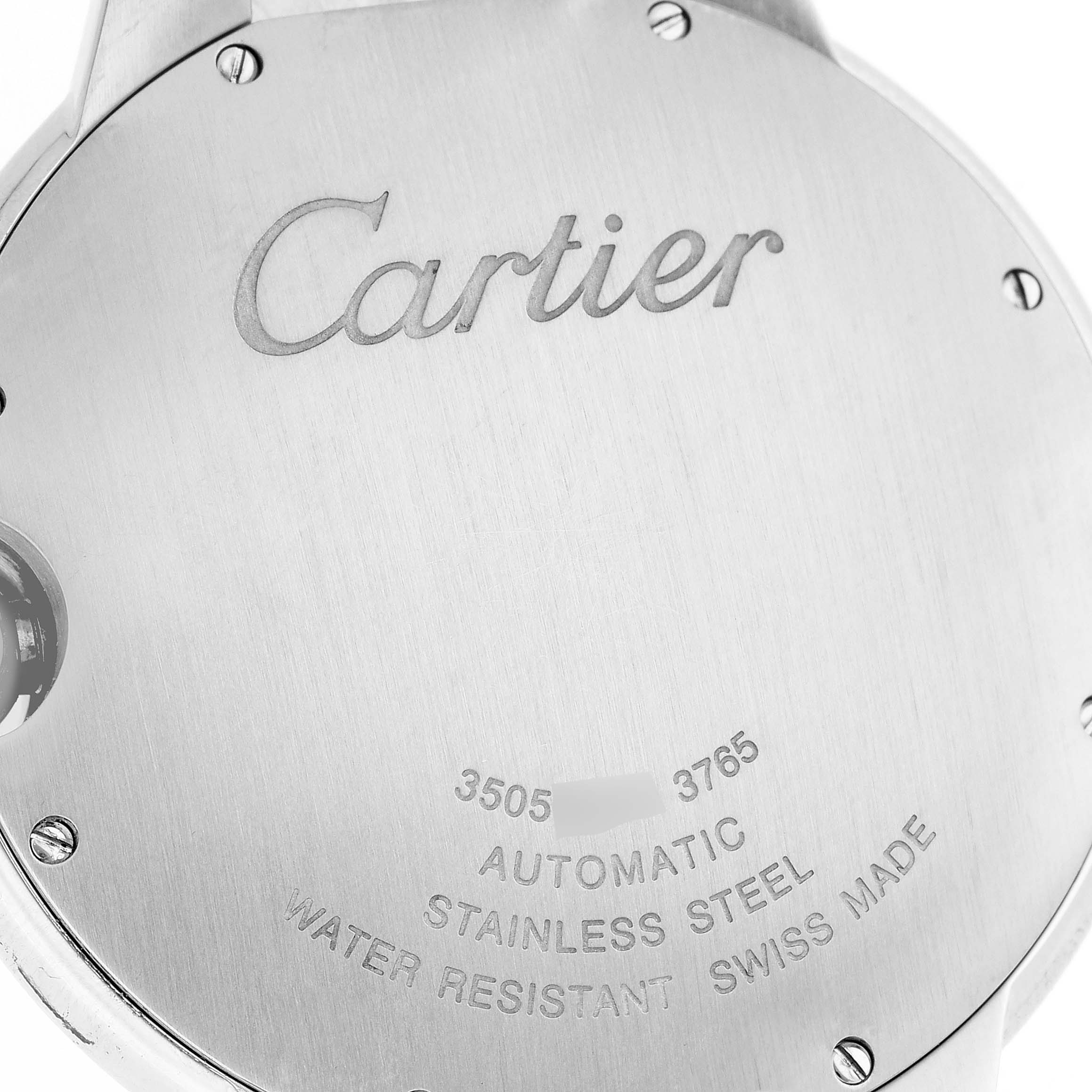 The image shows the back of the Cartier Ballon Bleu WSBB0027 Men's Stainless Steel Blue Dial watch, highlighting the brand's engraving and technical details.
