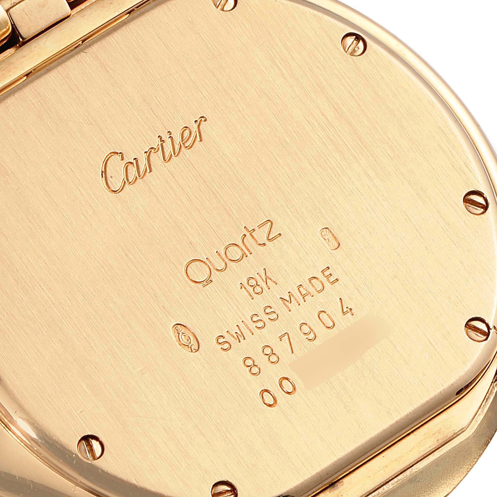 This image shows the case back of the Cartier Panthère watch, displaying inscriptions and the branding.
