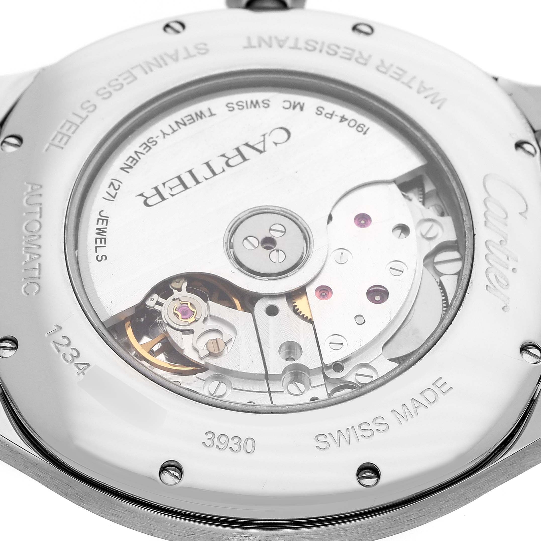 The image shows a rear view of the Drive de Cartier, highlighting its automatic movement and internal mechanics.