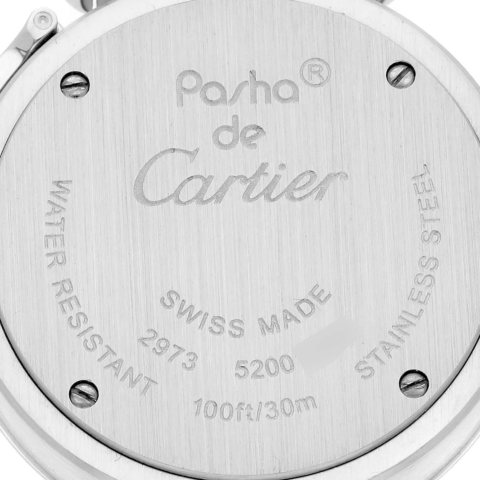 The image shows the back of a Cartier Pasha W3140024 Women's Stainless Steel Blue Dial W3140024 Women's Stainless Steel Blue Dial watch, highlighting engravings and screws.