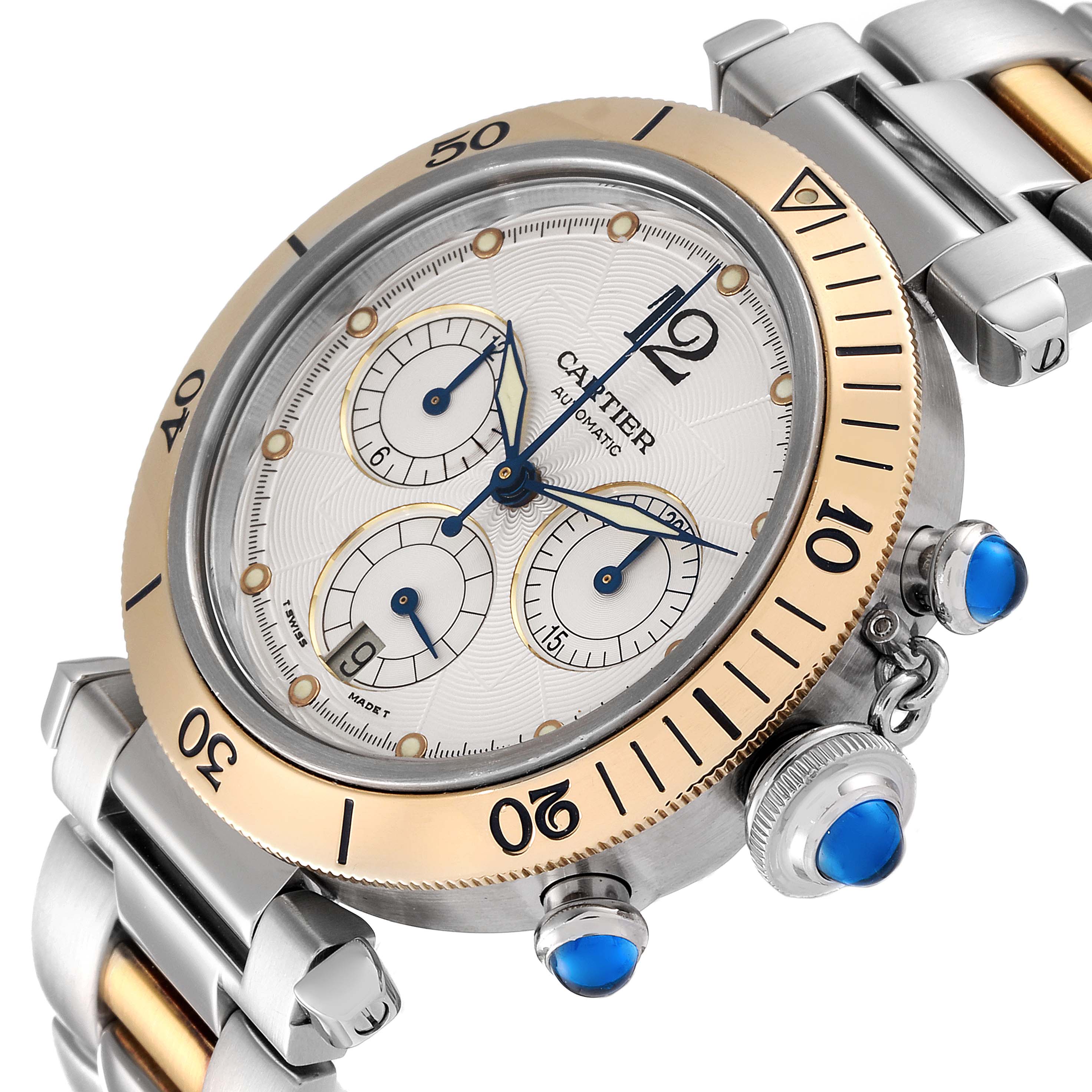 The image shows a Pasha model by Cartier at an angled side view, highlighting the face, bezel, subdials, and crown details.