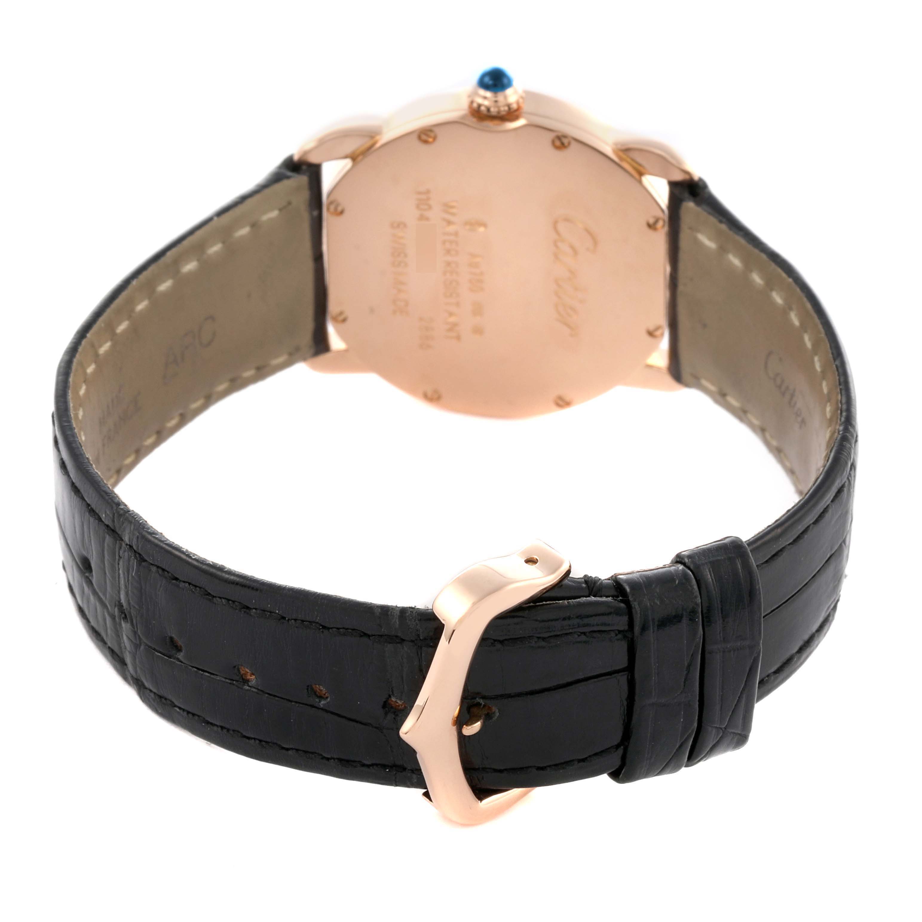 The Cartier Ronde W6800151 Women's Rose Gold Silver Dial W6800151 Women's Rose Gold Silver Dial watch is shown from the back, highlighting its case, crown, and black leather strap with a buckle.