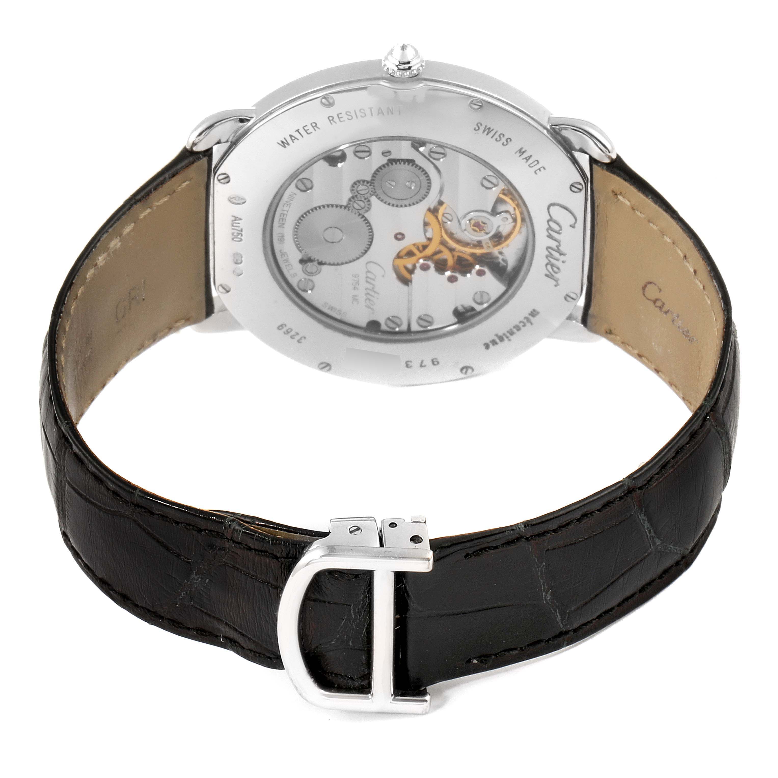 The image shows the back view of a Cartier Ronde WR007002 Men's White Gold Silver Dial WR007002 Men's White Gold Silver Dial model watch, highlighting its mechanical movements and leather strap.