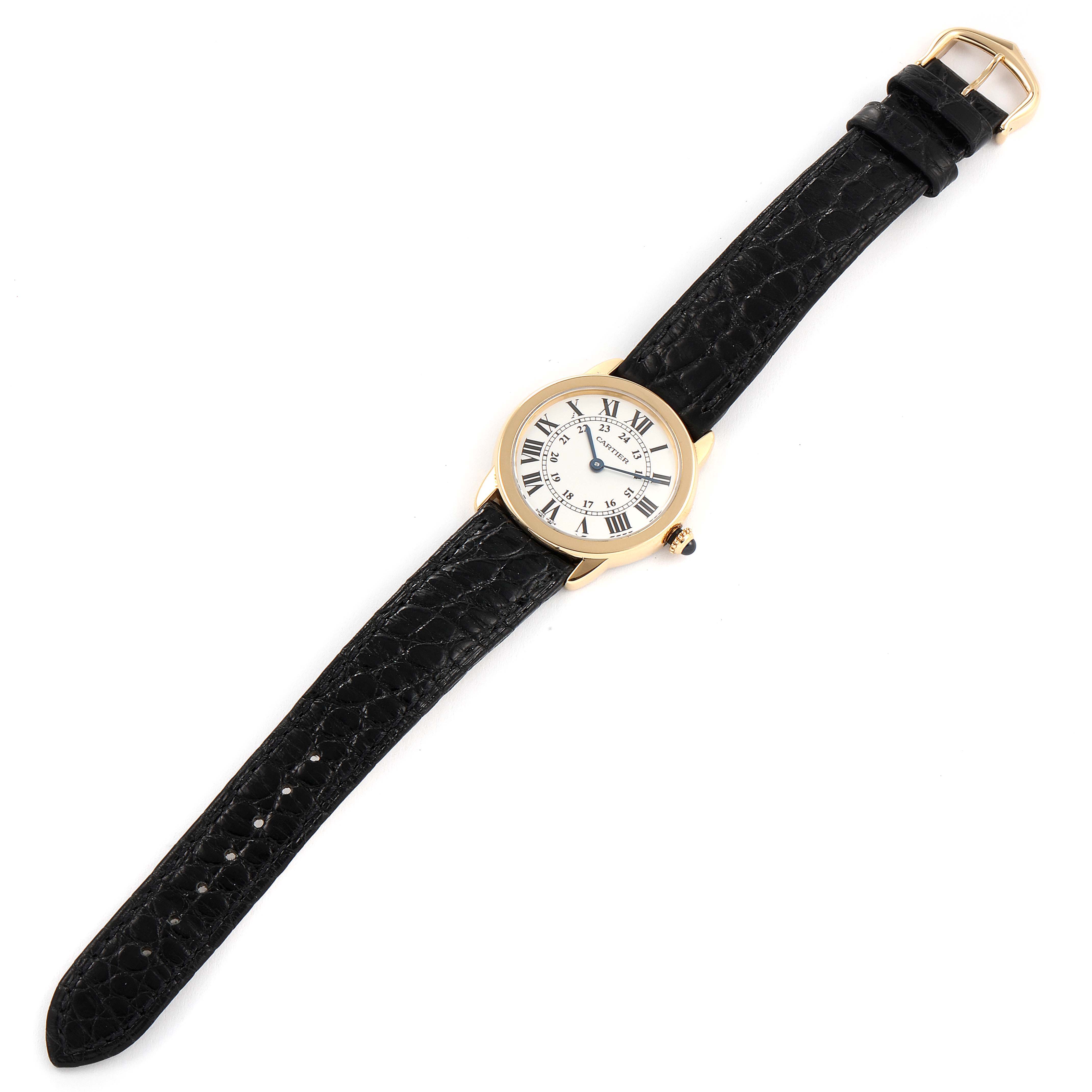 The image shows a top-down view of a Cartier Ronde W6700355 Women's Yellow Gold Silver Dial W6700355 Women's Yellow Gold Silver Dial model watch, displaying the dial, case, and black leather strap.