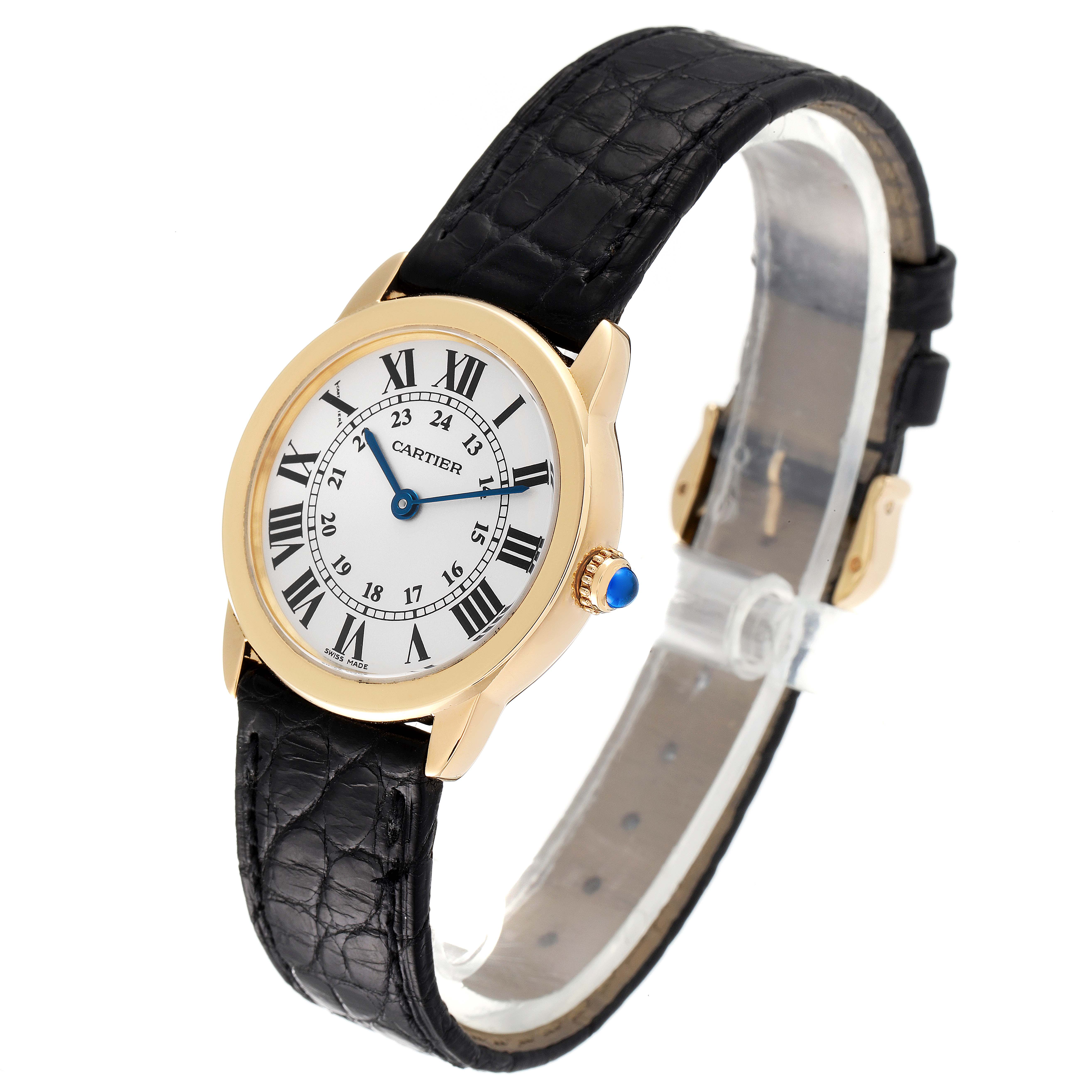 This image shows a Cartier Ronde W6700355 Women's Yellow Gold Silver Dial W6700355 Women's Yellow Gold Silver Dial model watch at a slight angle, highlighting its face, bezel, crown, and leather strap.