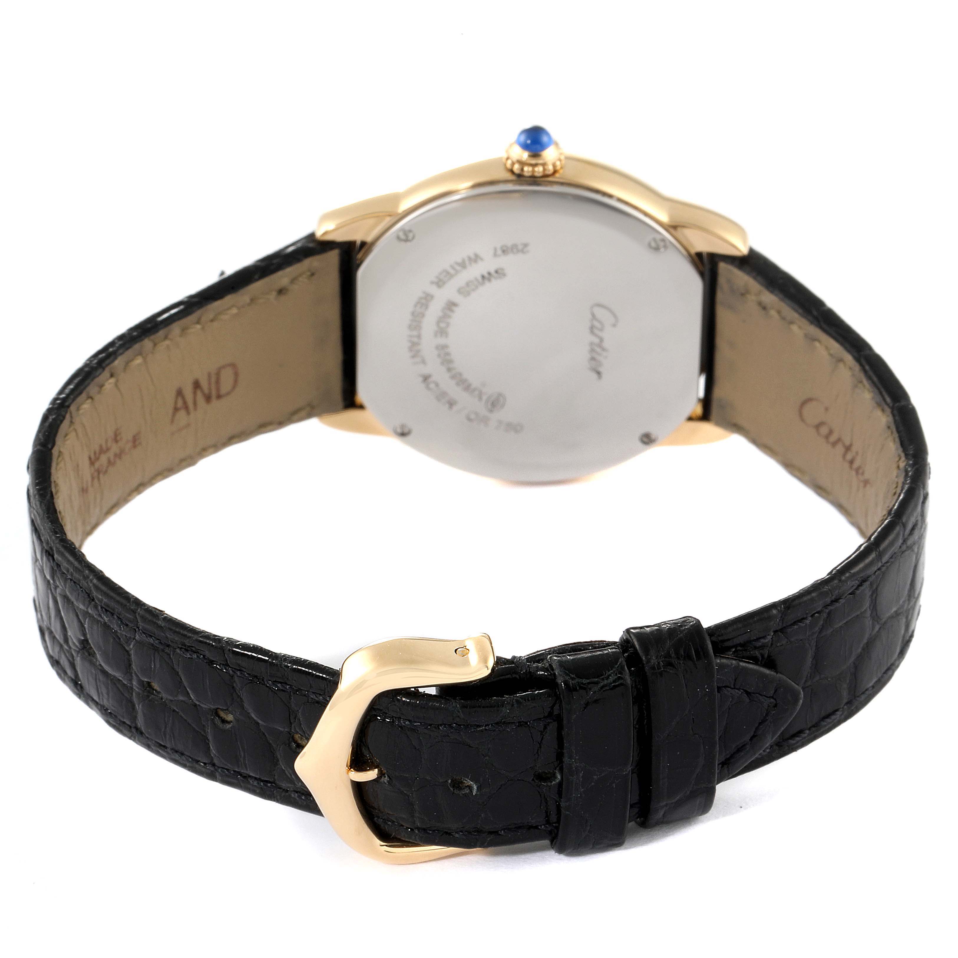 The image shows the back view of a Cartier Ronde W6700355 Women's Yellow Gold Silver Dial W6700355 Women's Yellow Gold Silver Dial watch, highlighting its clasp, leather strap, and case back details.