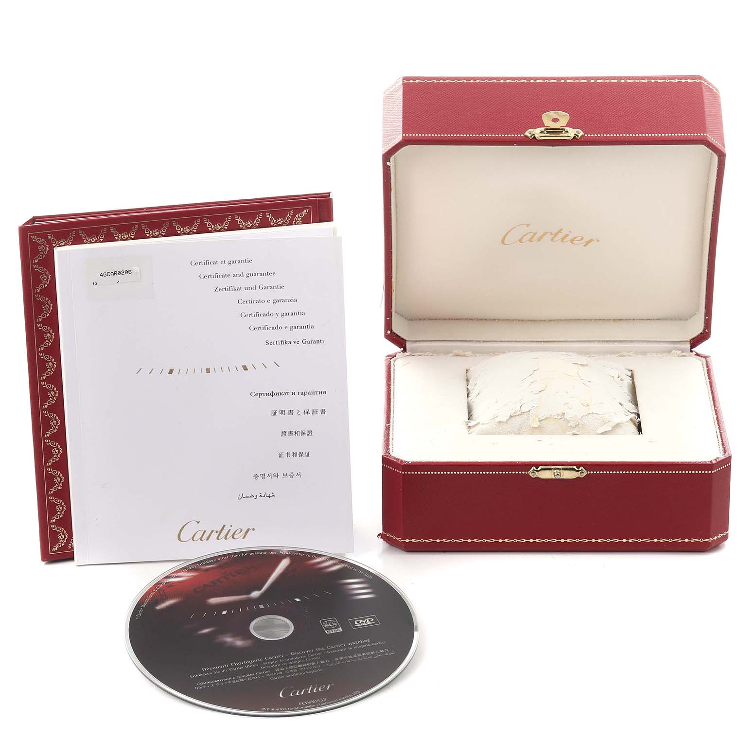 The image shows a Cartier Santos W20072X7 Men's Steel and Gold (two tone) Silver Dial W20072X7 Men's Steel and Gold (two tone) Silver Dial watch box, a warranty booklet, and a DVD, all at a front-angle view.