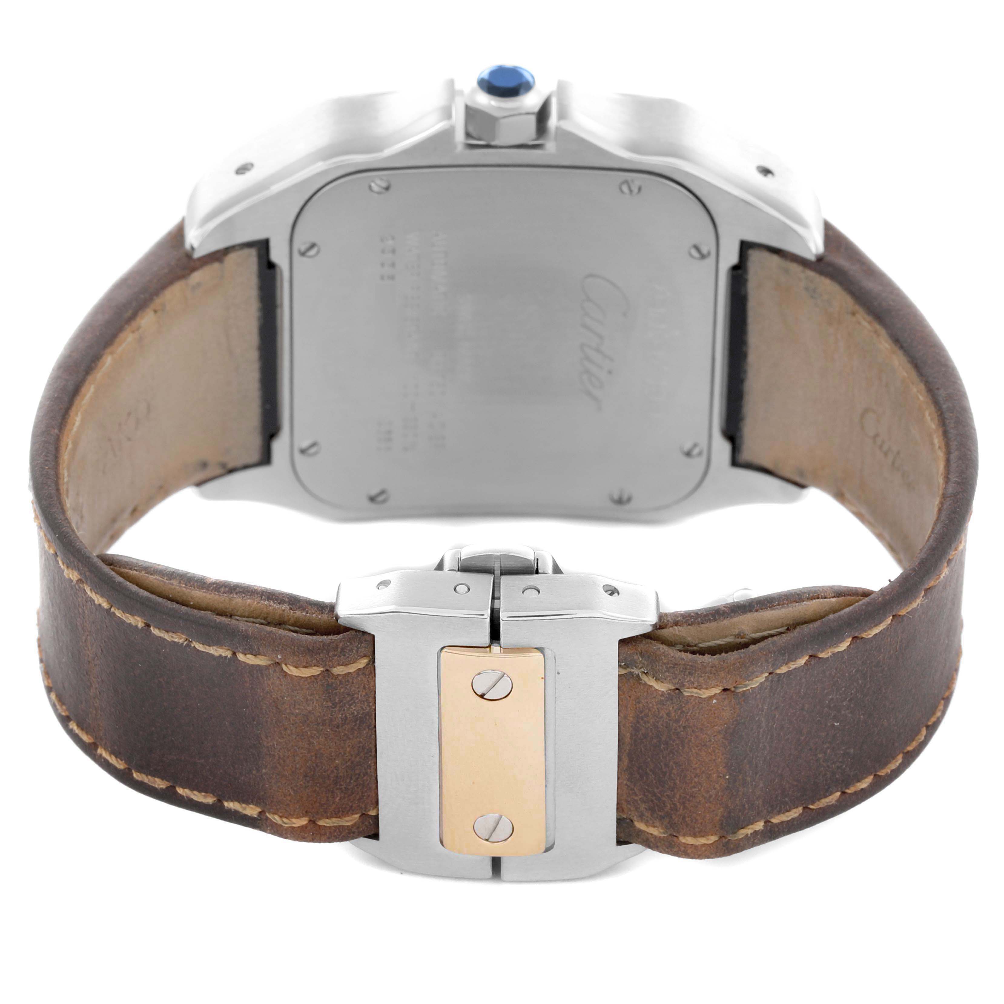 The image shows the back of a Santos model by Cartier, highlighting the leather strap and clasp.