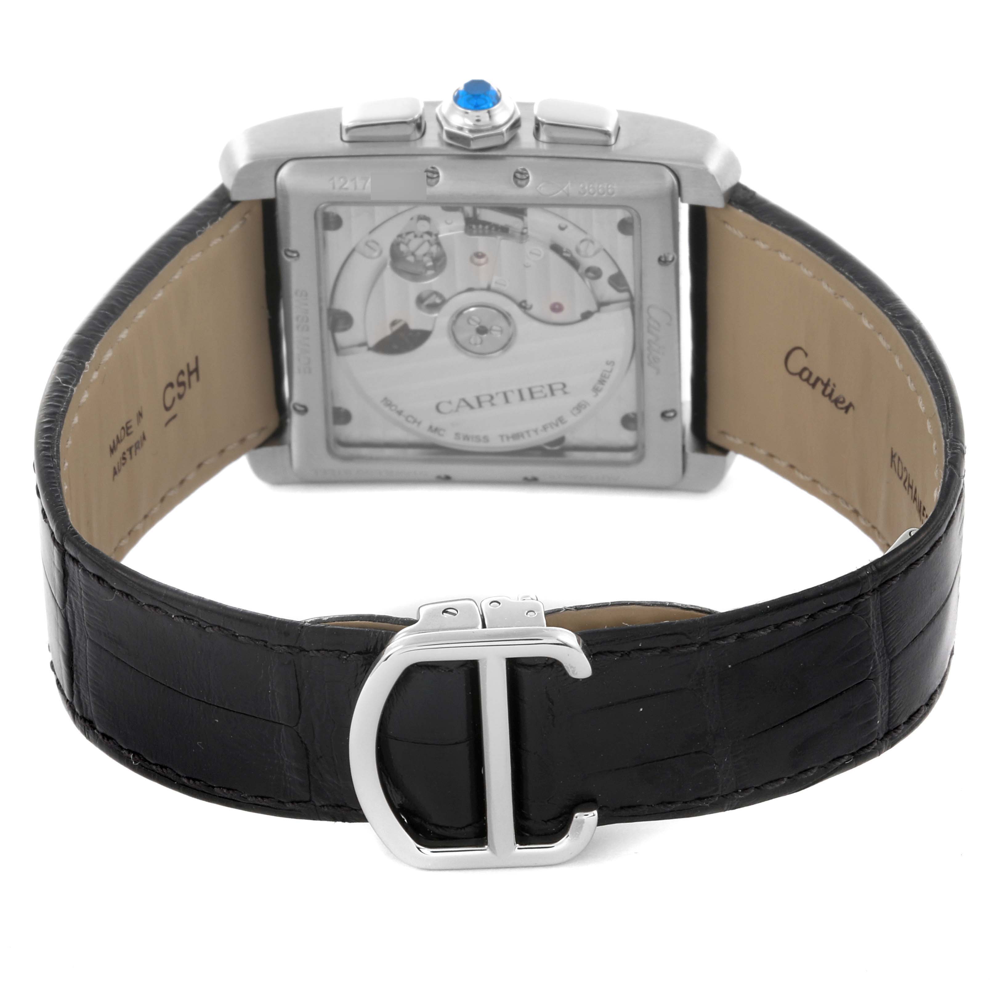 The image shows the back of the Cartier Tank MC W5330008 Men's Stainless Steel Grey Dial W5330008 Men's Stainless Steel Grey Dial, displaying the movement and the black leather strap with a clasp.