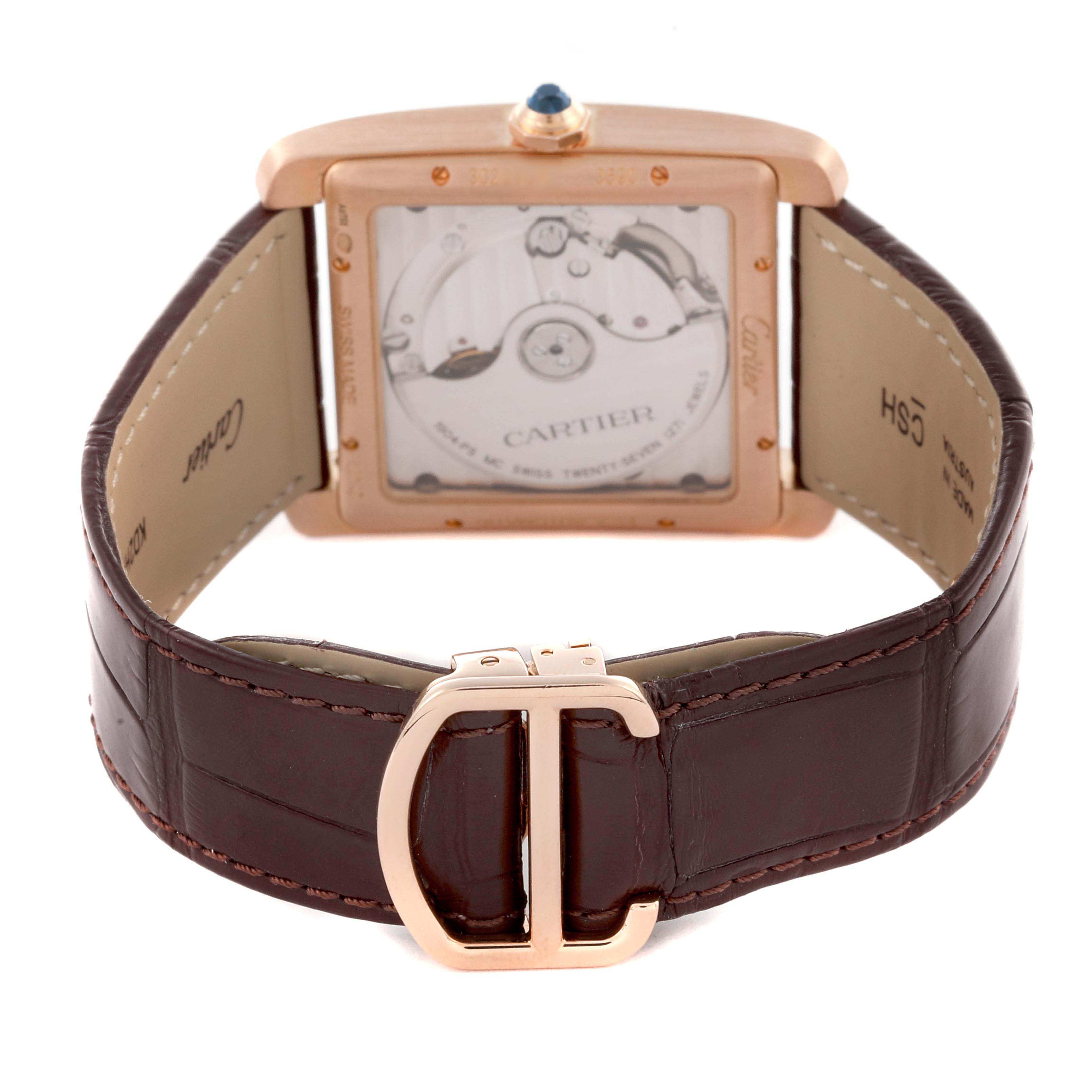 The image shows the back of the Cartier Tank MC W5330002 Men's Rose Gold Brown Dial W5330002 Men's Rose Gold Brown Dial watch, highlighting the case, mechanism, and strap with the buckle.