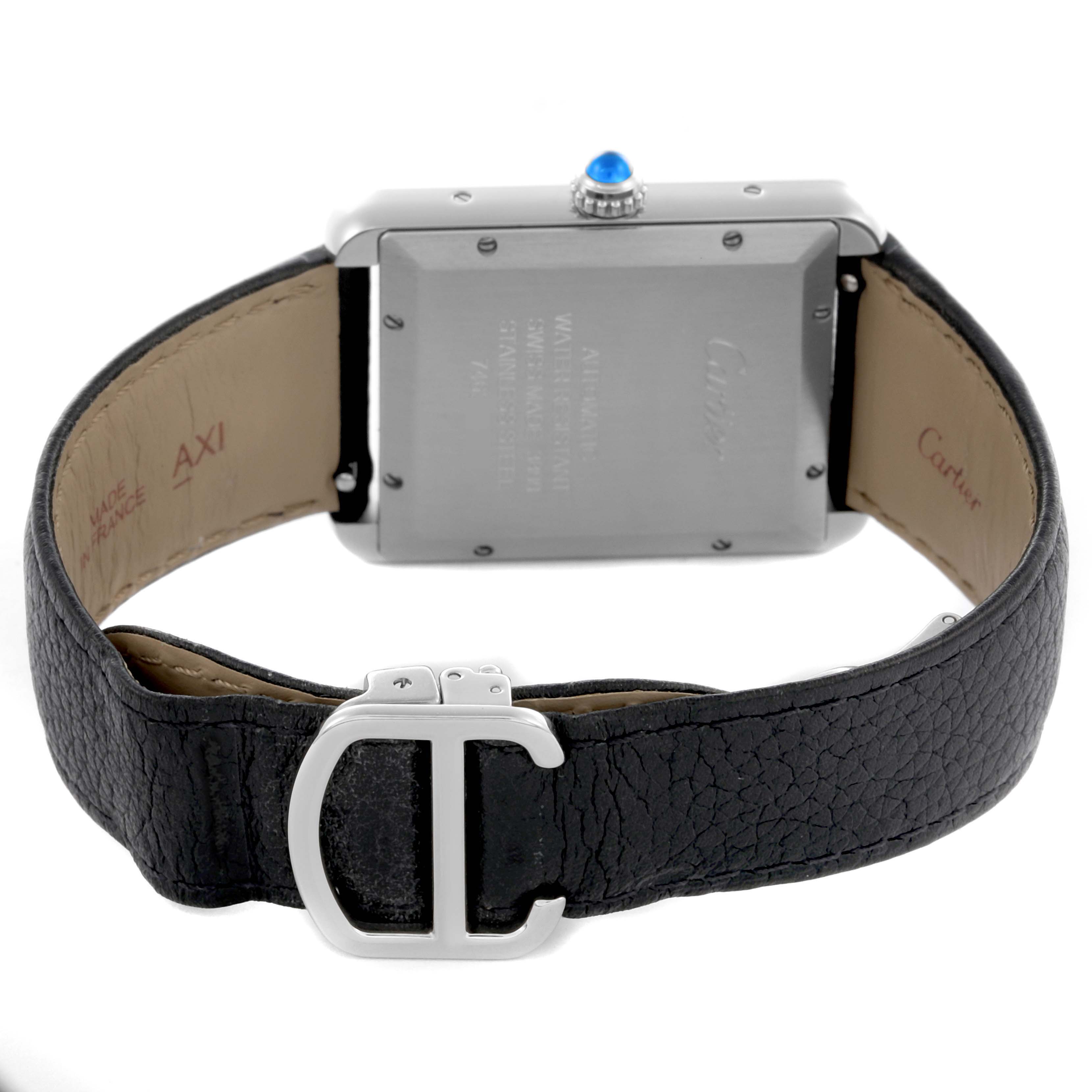 The Cartier Tank Solo WSTA0029 Men's Stainless Steel Silver Dial WSTA0029 Men's Stainless Steel Silver Dial watch is shown from the back, highlighting the case back, crown, and leather strap with clasp.