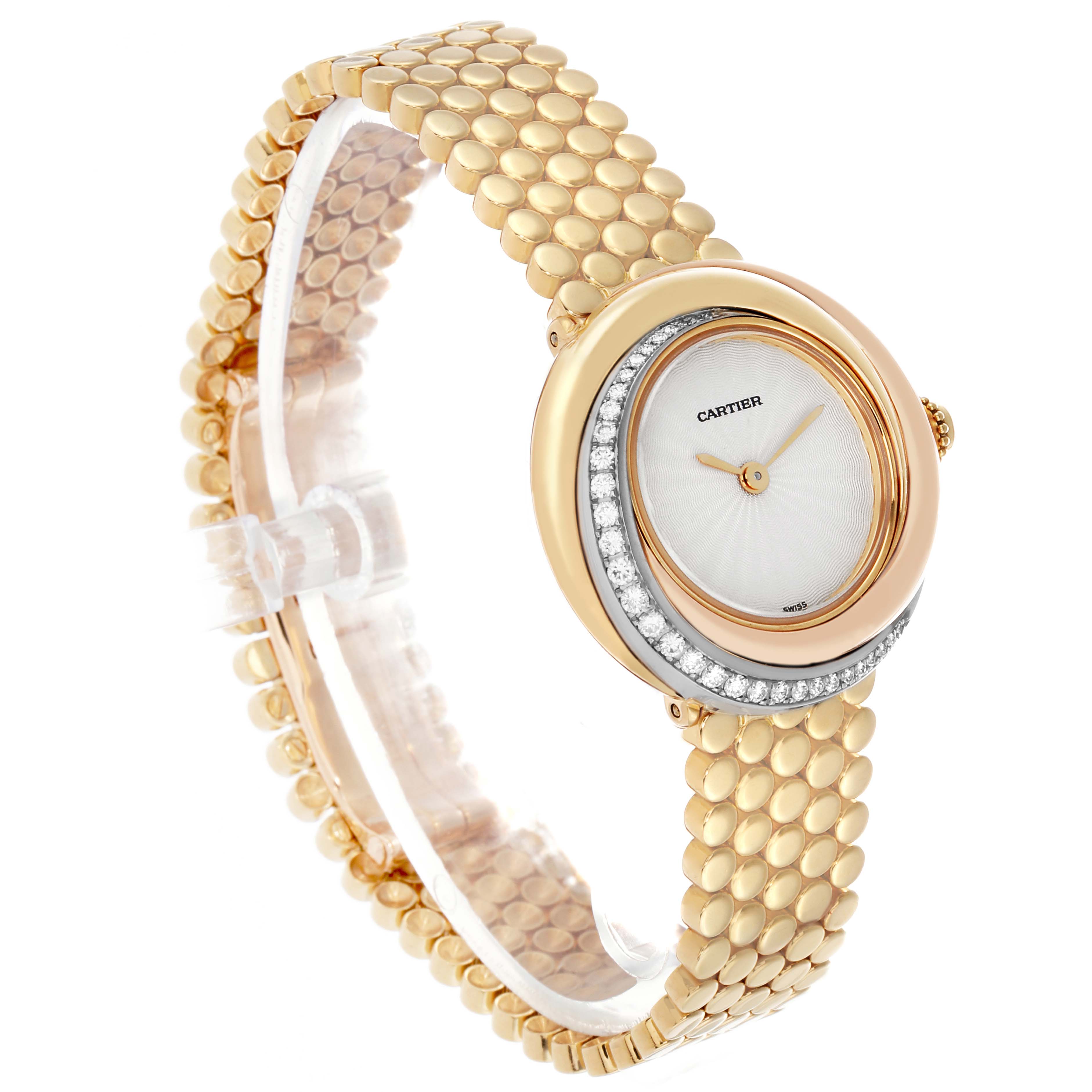 The Cartier Trinity WG200258 Women's Yellow Gold White Dial watch is shown at a side angle, highlighting its round case, diamond bezel, and gold strap.