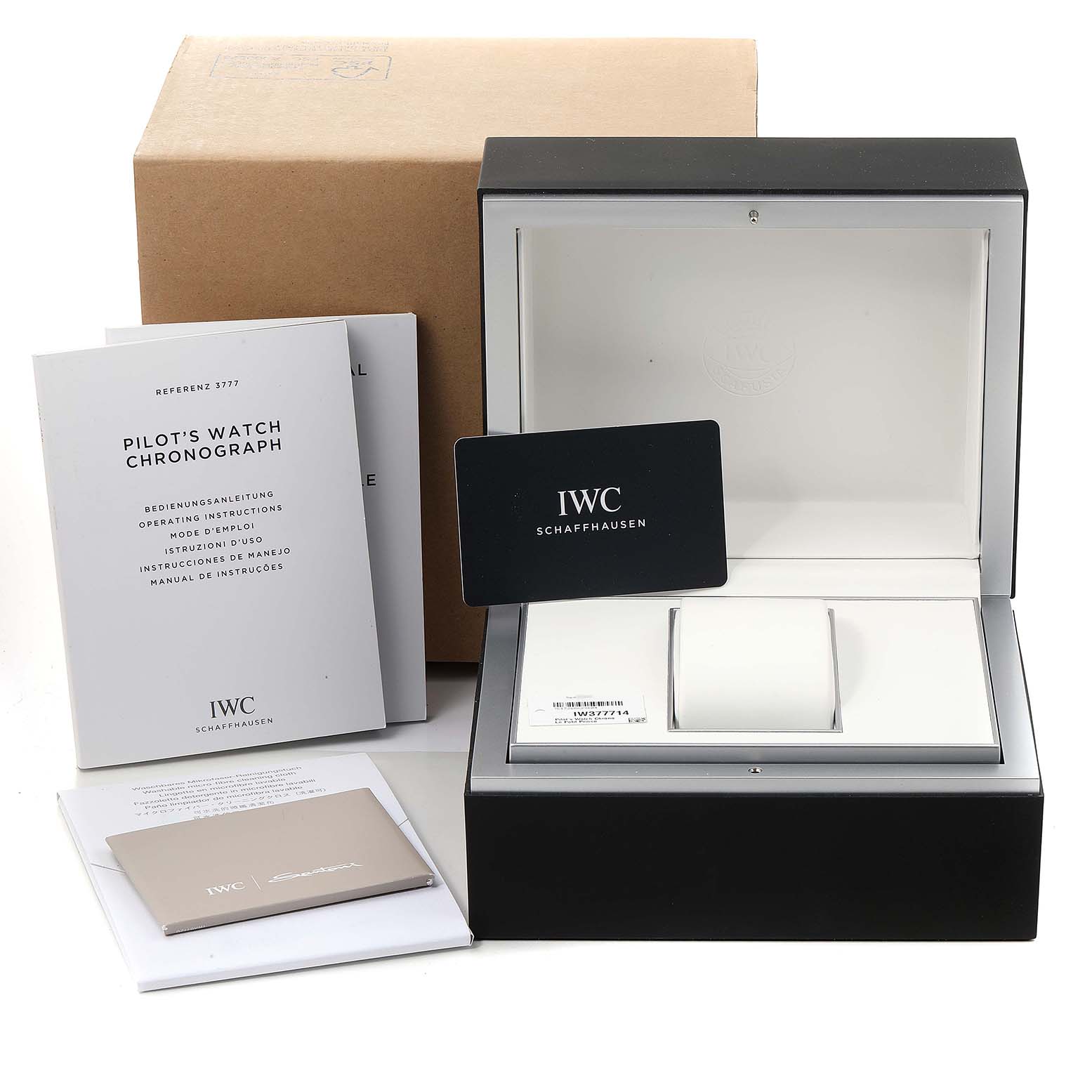 This image shows the box, manuals, and warranty card for the IWC Pilot IW377714 Men's Stainless Steel Blue Dial IW377714 Men's Stainless Steel Blue Dial's Watch Chronograph.