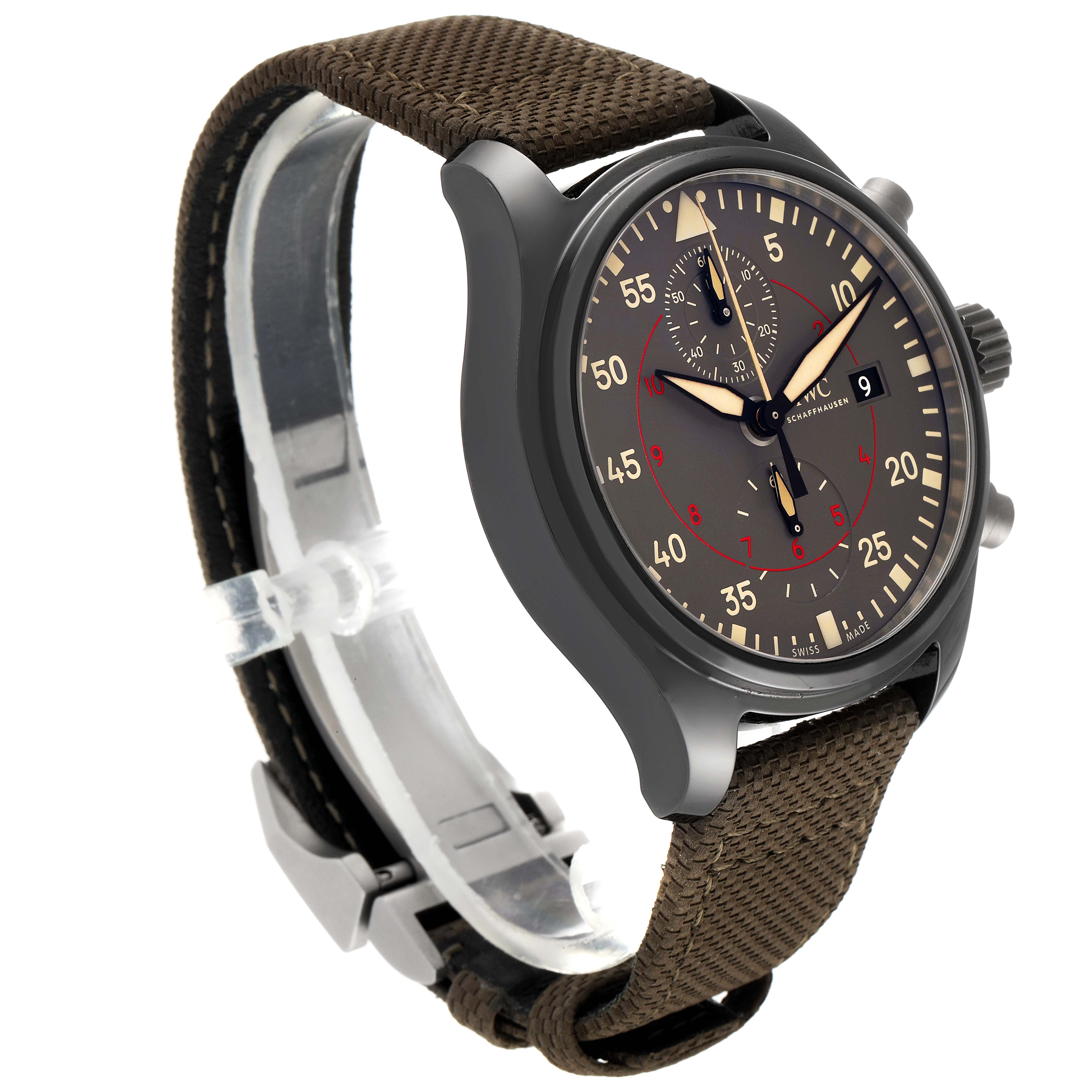 The image depicts an IWC Pilot IW389002 Men's Ceramic Black Dial IW389002 Men's Ceramic Black Dial model watch angled slightly from the side, showcasing its dial, bezel, crown, and brown strap.