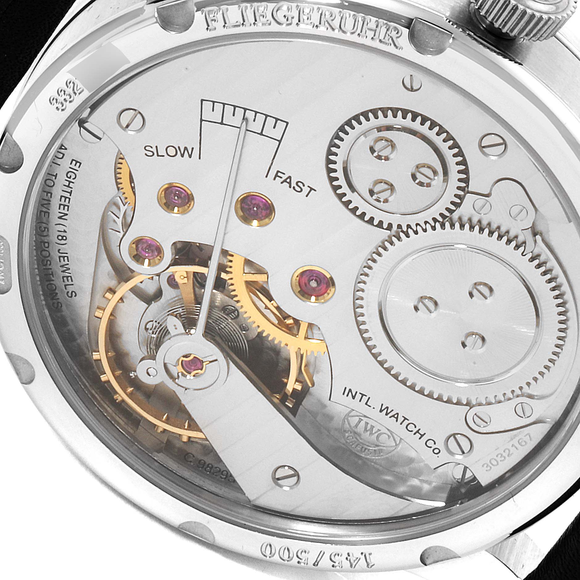 The image shows the intricate back view of the IWC Pilot IW325405 Men's Titanium Silver Dial IW325405 Men's Titanium Silver Dial model watch, highlighting its internal mechanical components.