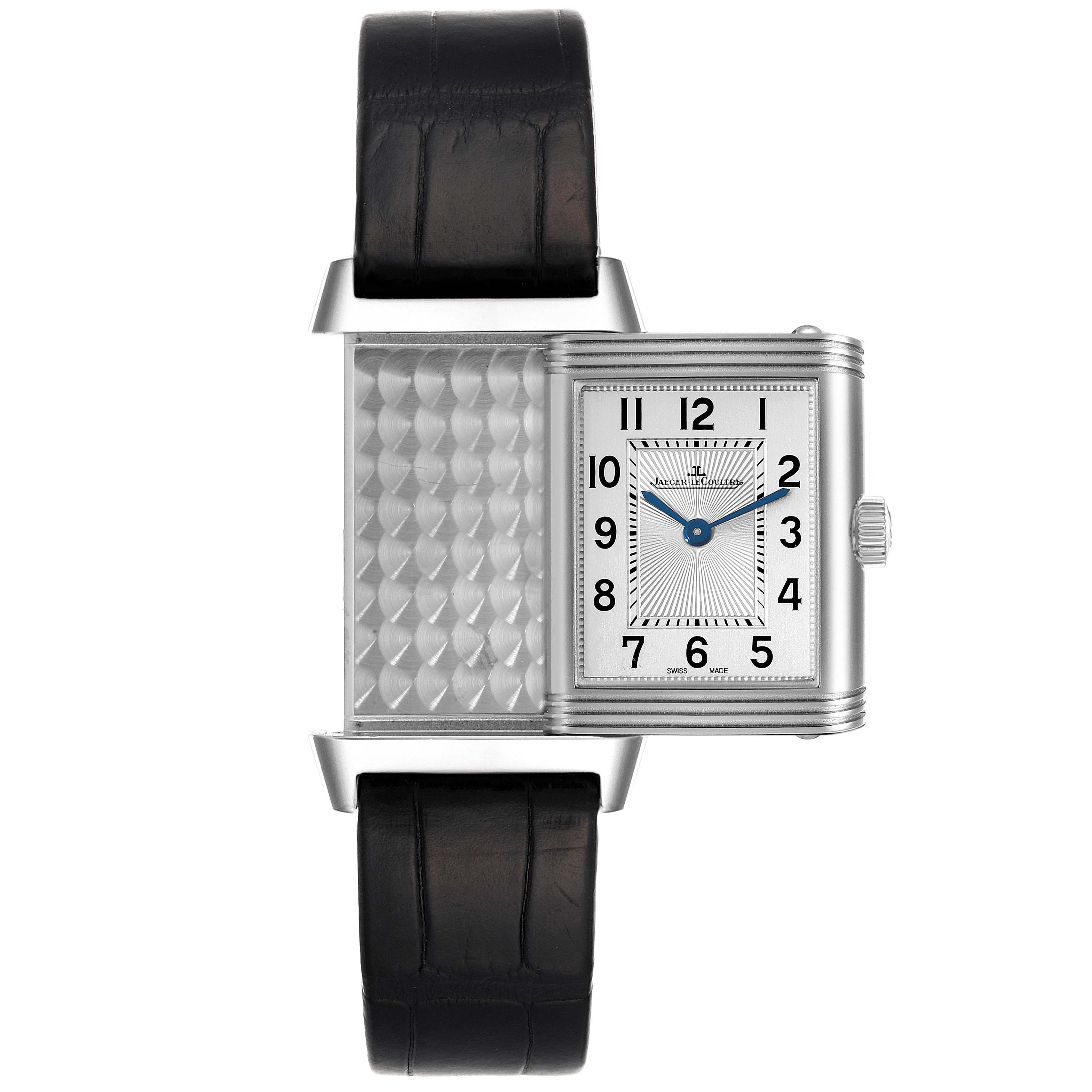 The Jaeger LeCoultre Reverso Q2668430 Women's Stainless Steel Silver Dial Q2668430 Women's Stainless Steel Silver Dial watch is shown straight on with its case flipped to display the patterned metal reverse side.
