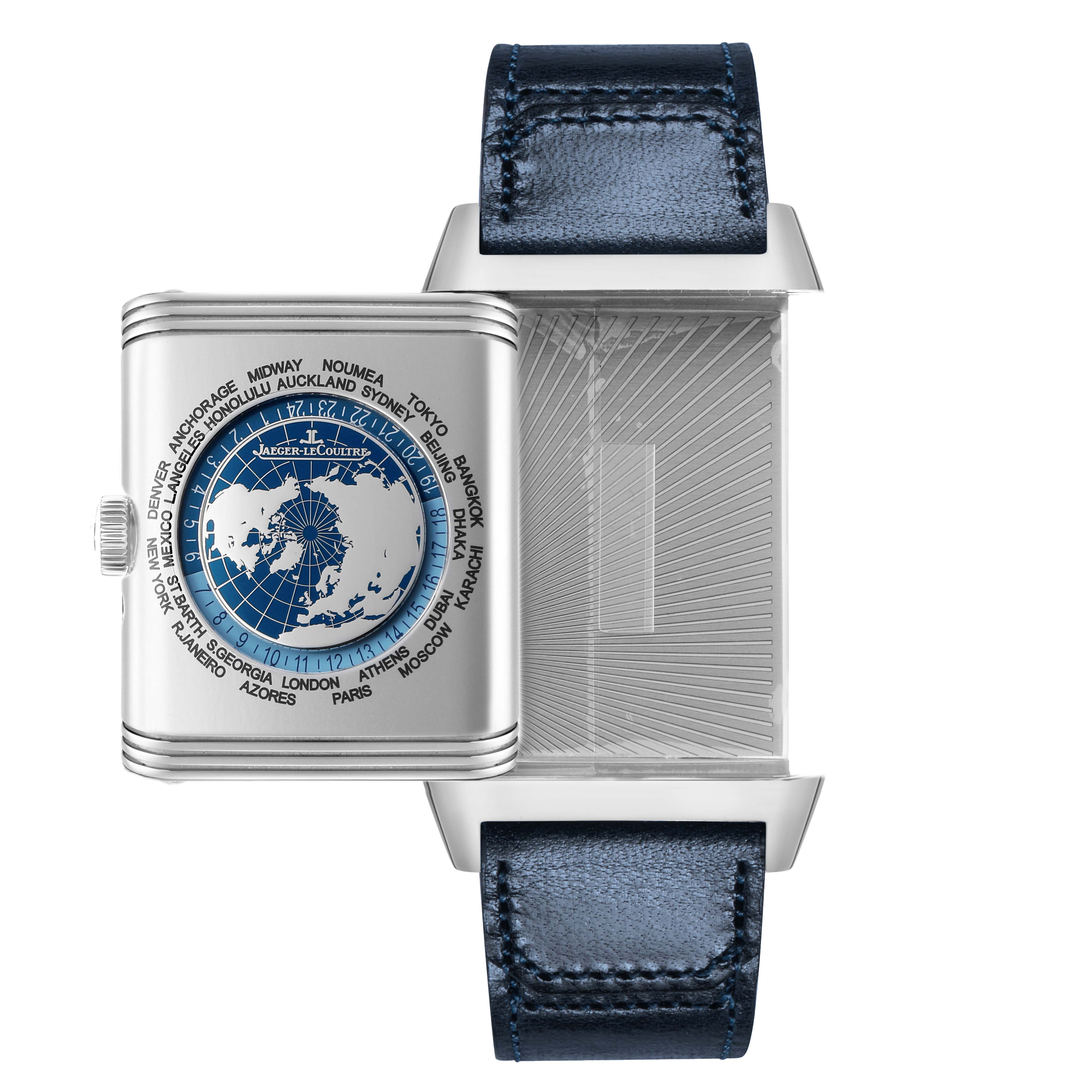 The Jaeger-LeCoultre Reverso model is shown with its case pivoted open, displaying the world time dial and the inner case detailing.