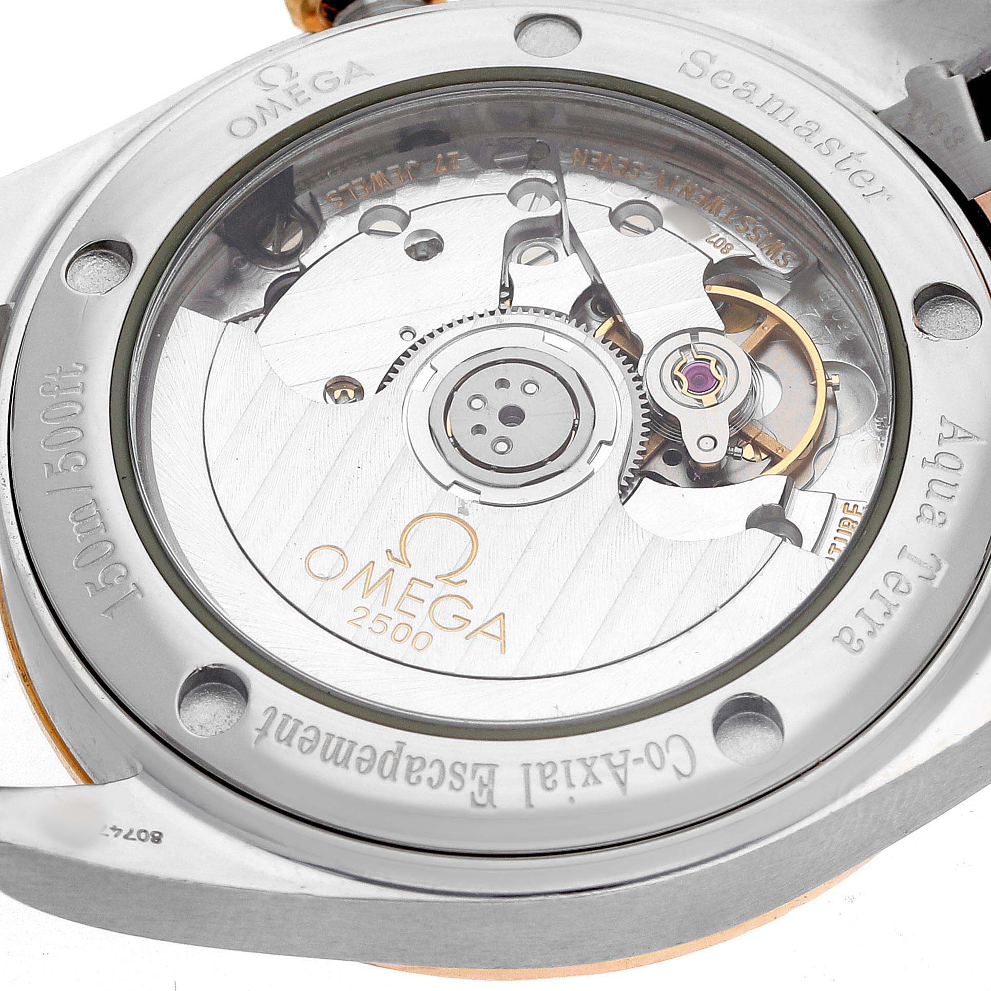 The image shows the case back of the Omega 2309.75.00 Women's Steel and Gold (two tone) Mother of Pearl Dial Aqua Terra model 2309.75.00, highlighting the Co-Axial escapement movement.