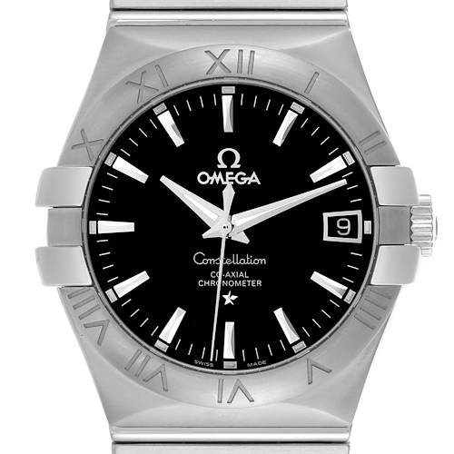 The Omega Constellation watch is shown from the front, highlighting its black dial, Roman numeral bezel, and date feature.