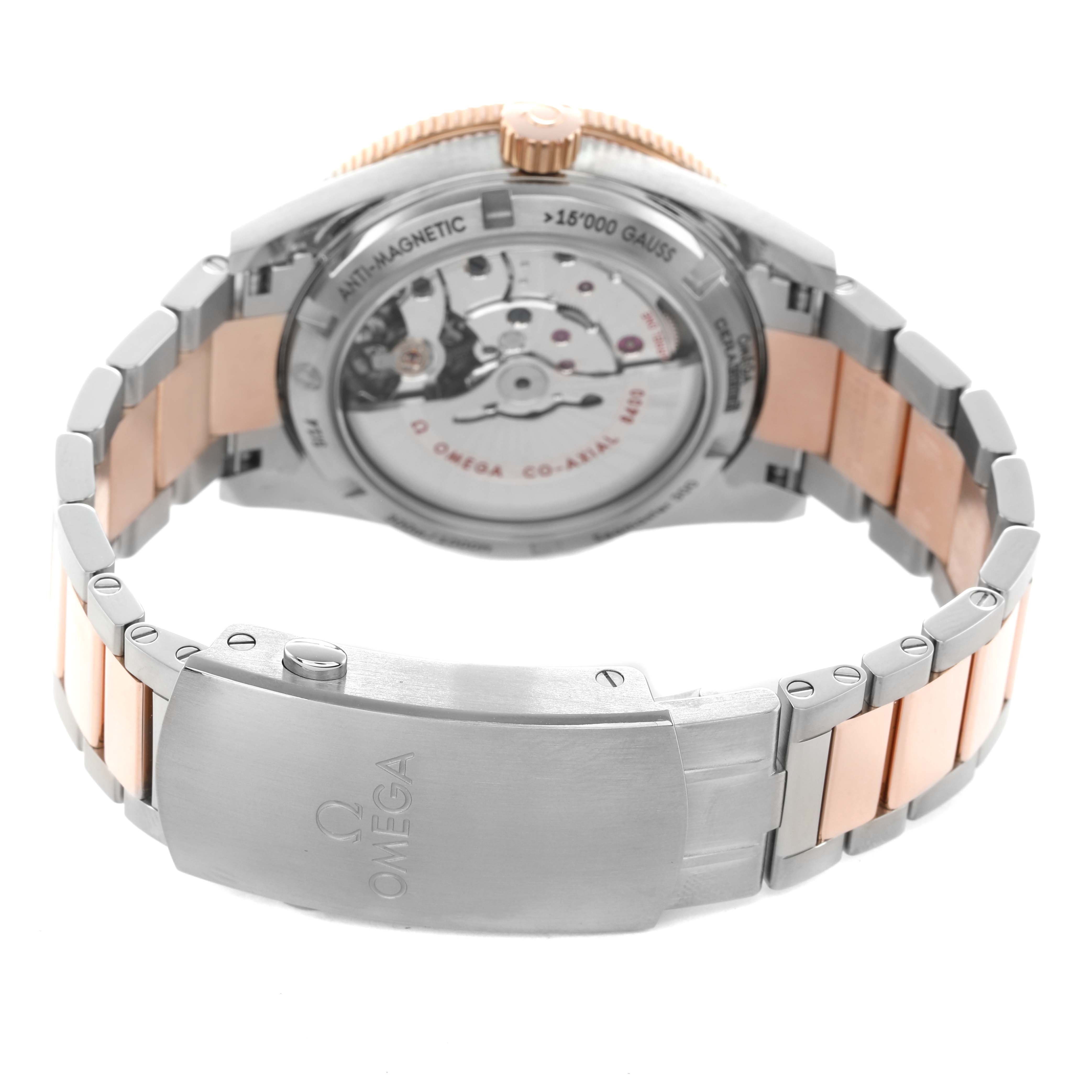 The image shows the back view of the Omega Seamaster 233.60.41.21.03.001 Men's Titanium Blue Dial, displaying the movement and the bracelet clasp.