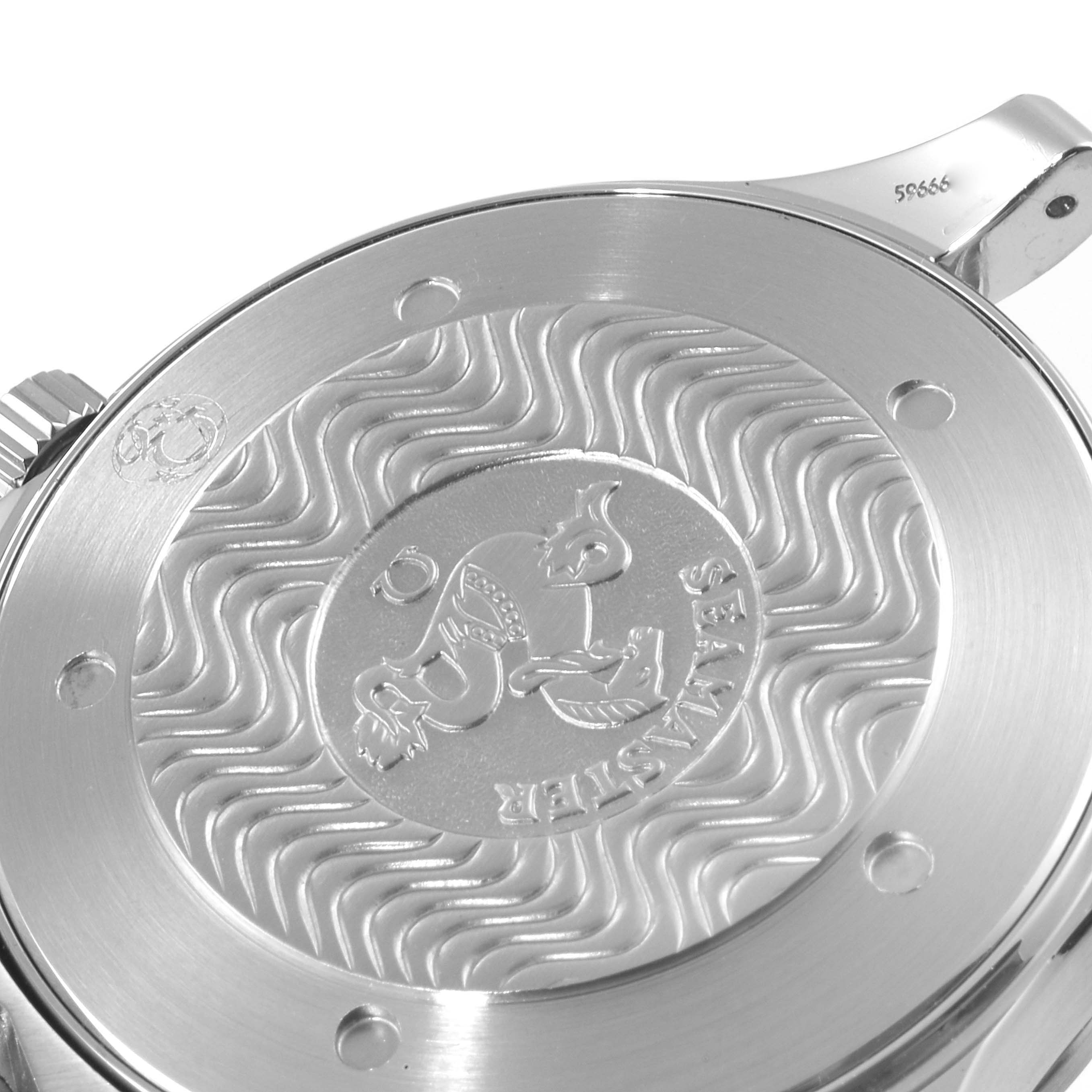 The image shows a detailed view of the case back of an Omega Seamaster 2541.80.00 Men's Stainless Steel Blue Dial 2541.80.00 Men's Stainless Steel Blue Dial watch, highlighting the engraved logo and wavy design.