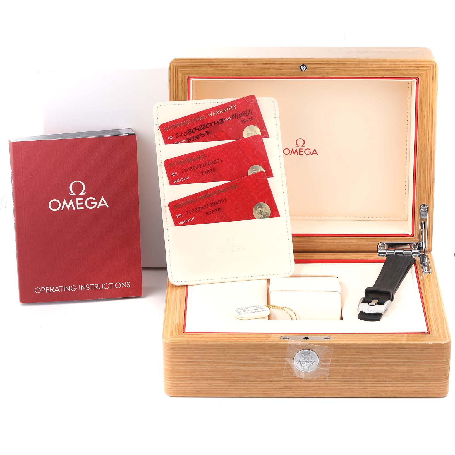 The image shows the box, warranty cards, operating instructions, and strap of an Omega Seamaster 210.30.42.20.04.001 Men's Stainless Steel White Dial 210.30.42.20.04.001 Men's Stainless Steel White Dial watch.