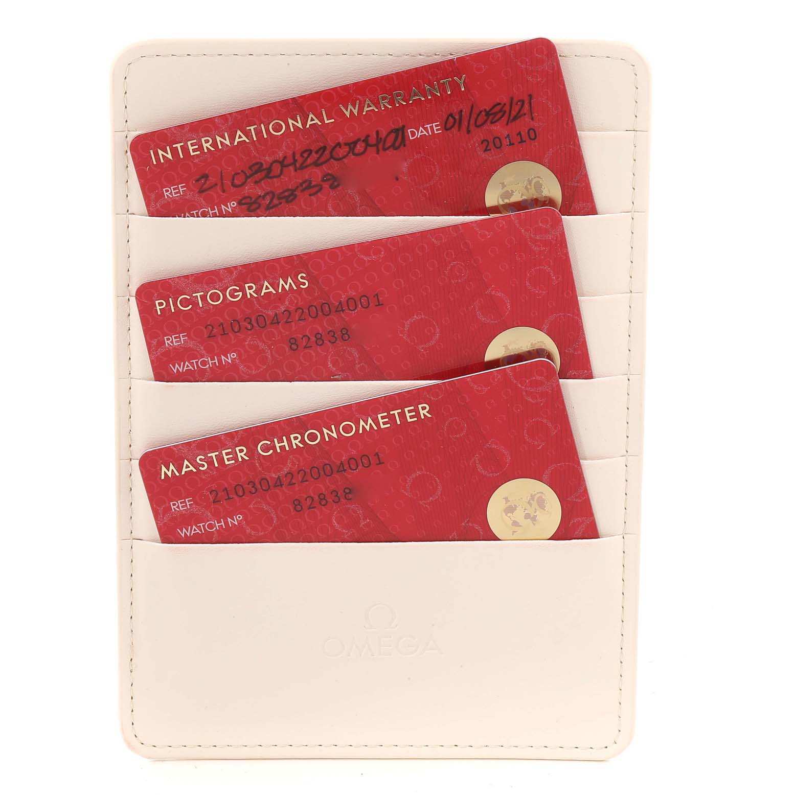 The image shows warranty cards and pictograms for the Omega Seamaster 210.30.42.20.04.001 Men's Stainless Steel White Dial 210.30.42.20.04.001 Men's Stainless Steel White Dial model, displayed in a white cardholder.