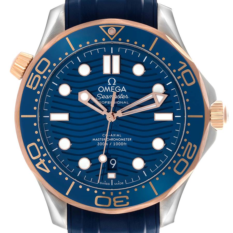 The Omega Seamaster watch is shown from a front angle, highlighting the blue dial, gold accents, and bezel markings.