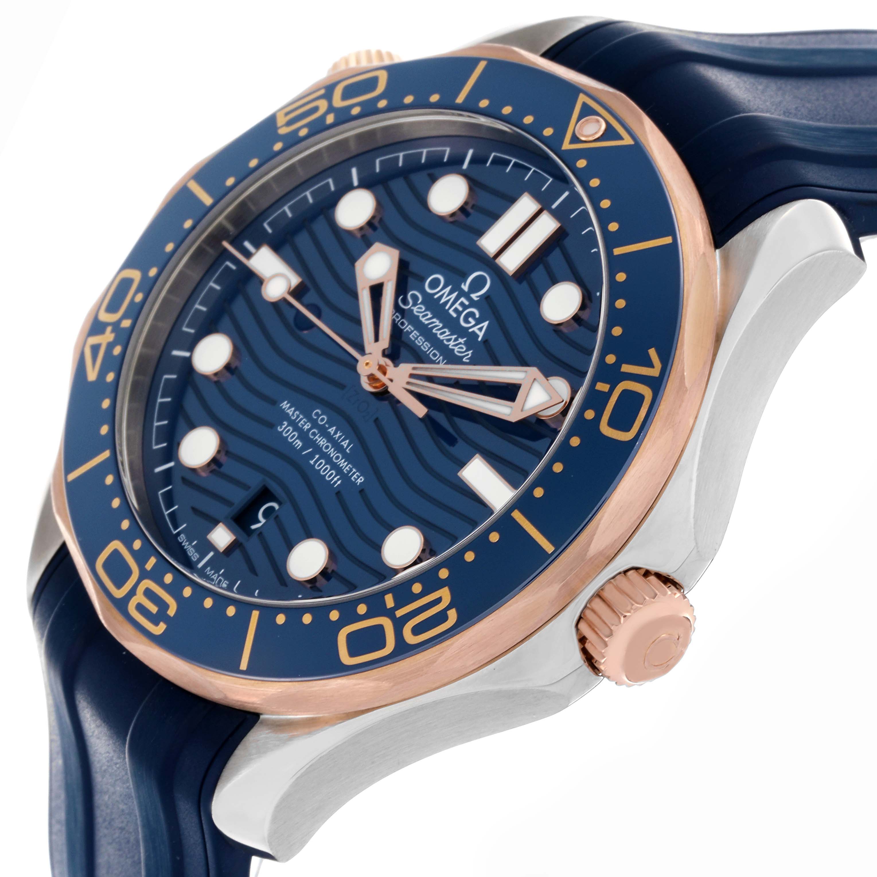 The Omega Seamaster 210.22.42.20.03.002 Men's Steel and Gold (two tone) Blue Dial 210.22.42.20.03.002 Men's Steel and Gold (two tone) Blue Dial watch is shown at a three-quarter angle, highlighting the face, bezel, crown, and part of the strap.