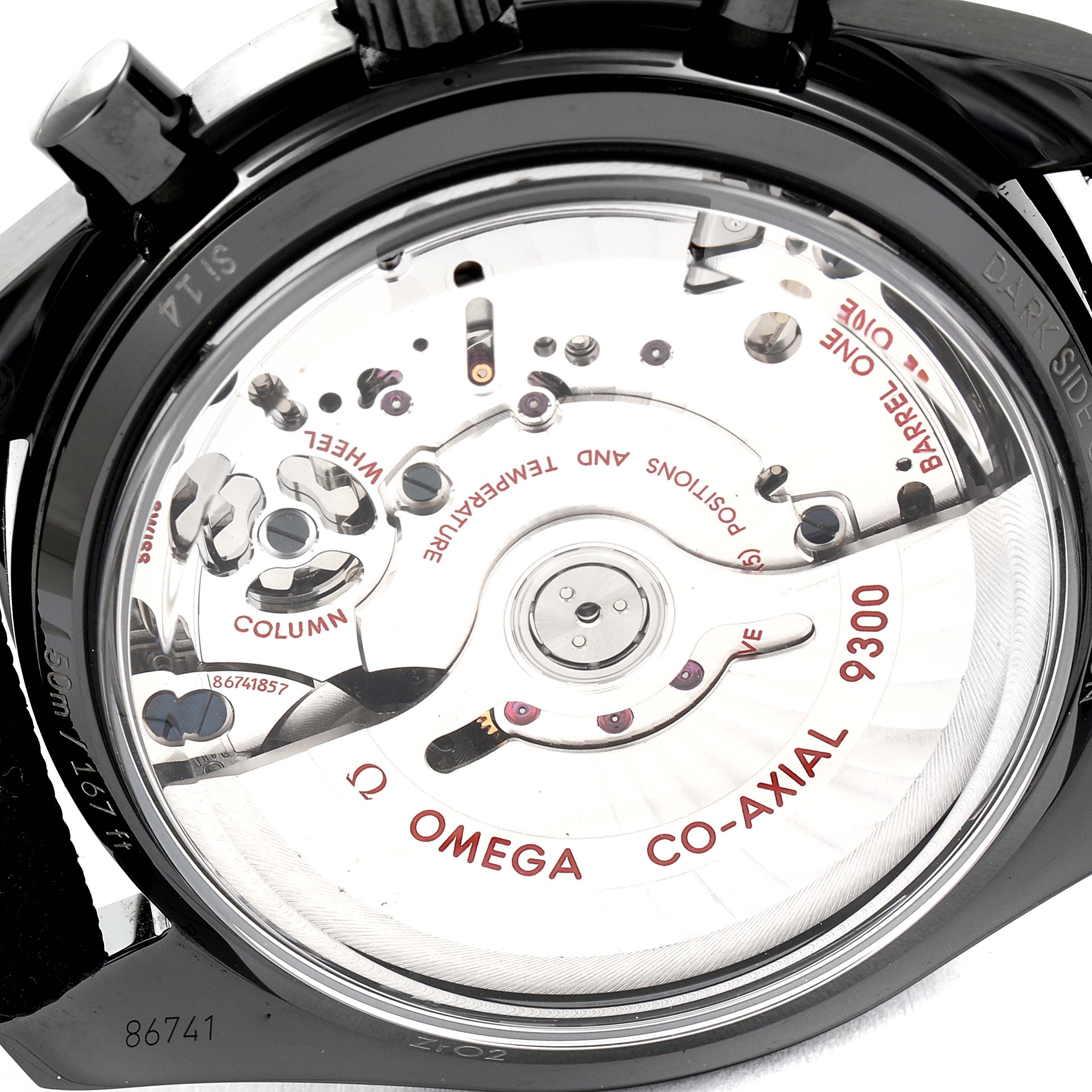 This image shows a rear view of the Omega Speedmaster 311.92.44.51.01.003 Men
s Stainless Steel Black Dial 311.92.44.51.01.003 Men
s Stainless Steel Black Dial watch, highlighting its Co-Axial 9300 movement mechanism.