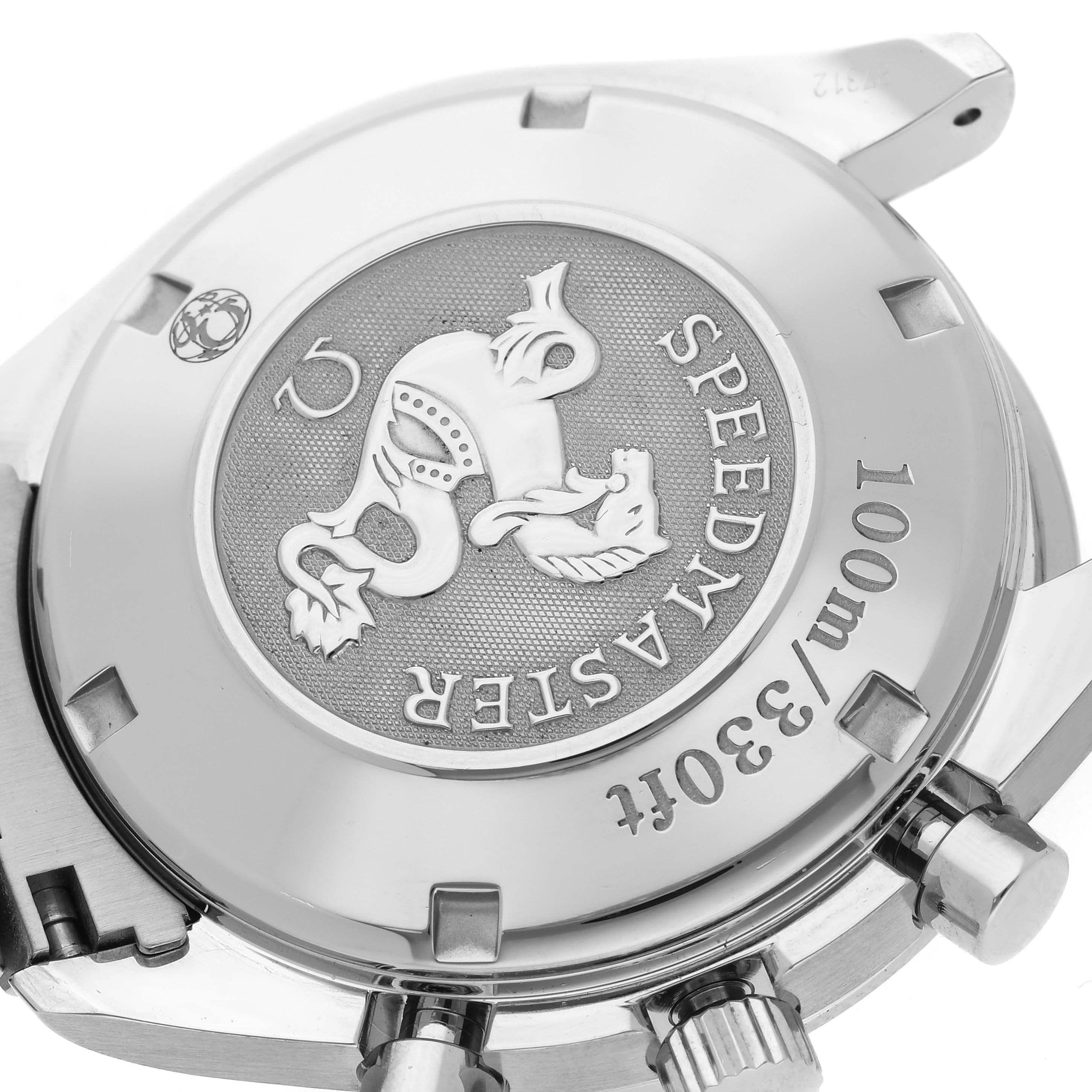 The image shows the case back of the Omega Speedmaster 323.30.40.40.06.001 Men's Stainless Steel Grey Dial 323.30.40.40.06.001 Men's Stainless Steel Grey Dial, highlighting its engraved logo and markings.