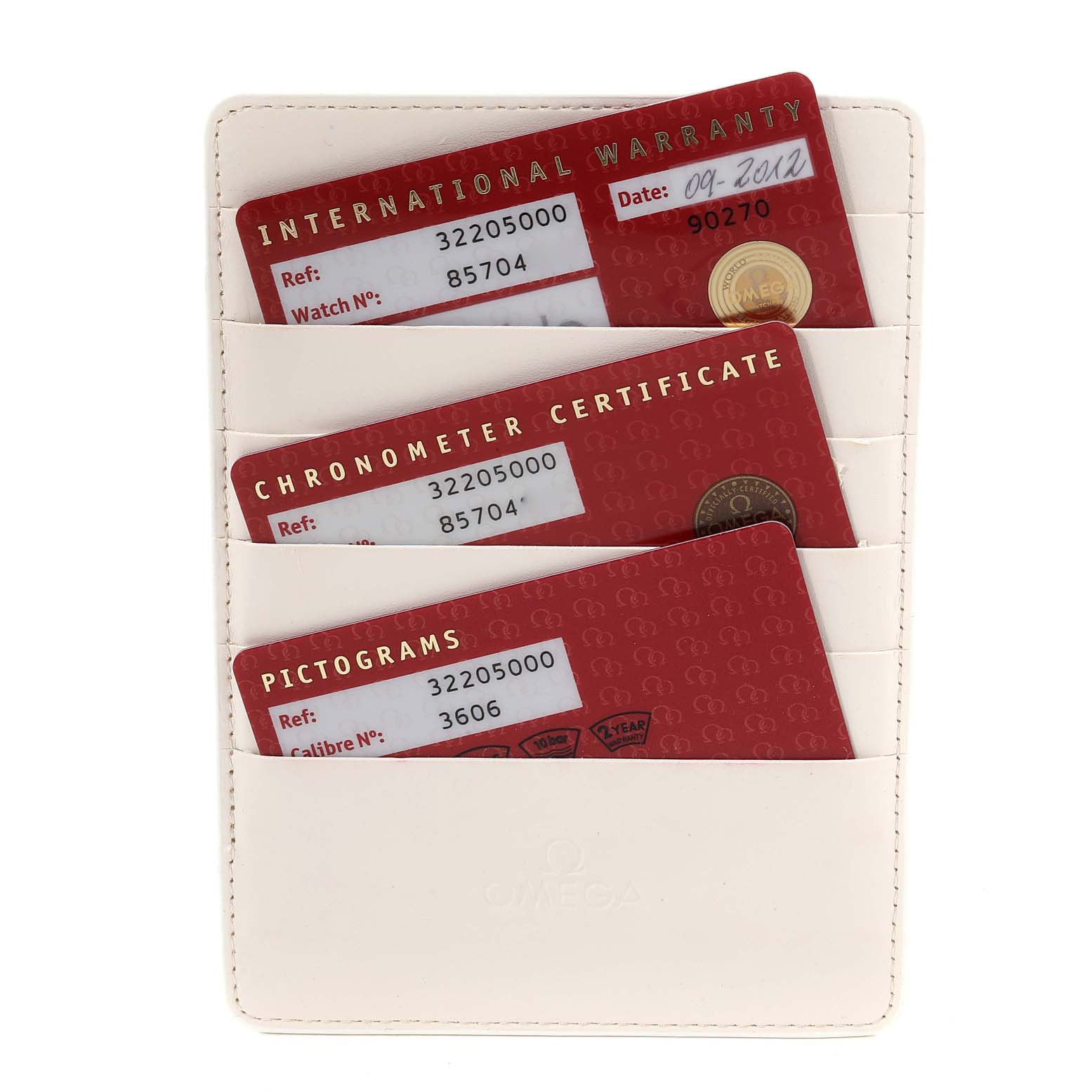 The image shows the warranty cards and certificates in a pouch for an Omega Speedmaster 3220.50.00 Men
s Stainless Steel Black Dial 3220.50.00 Men
s Stainless Steel Black Dial watch.