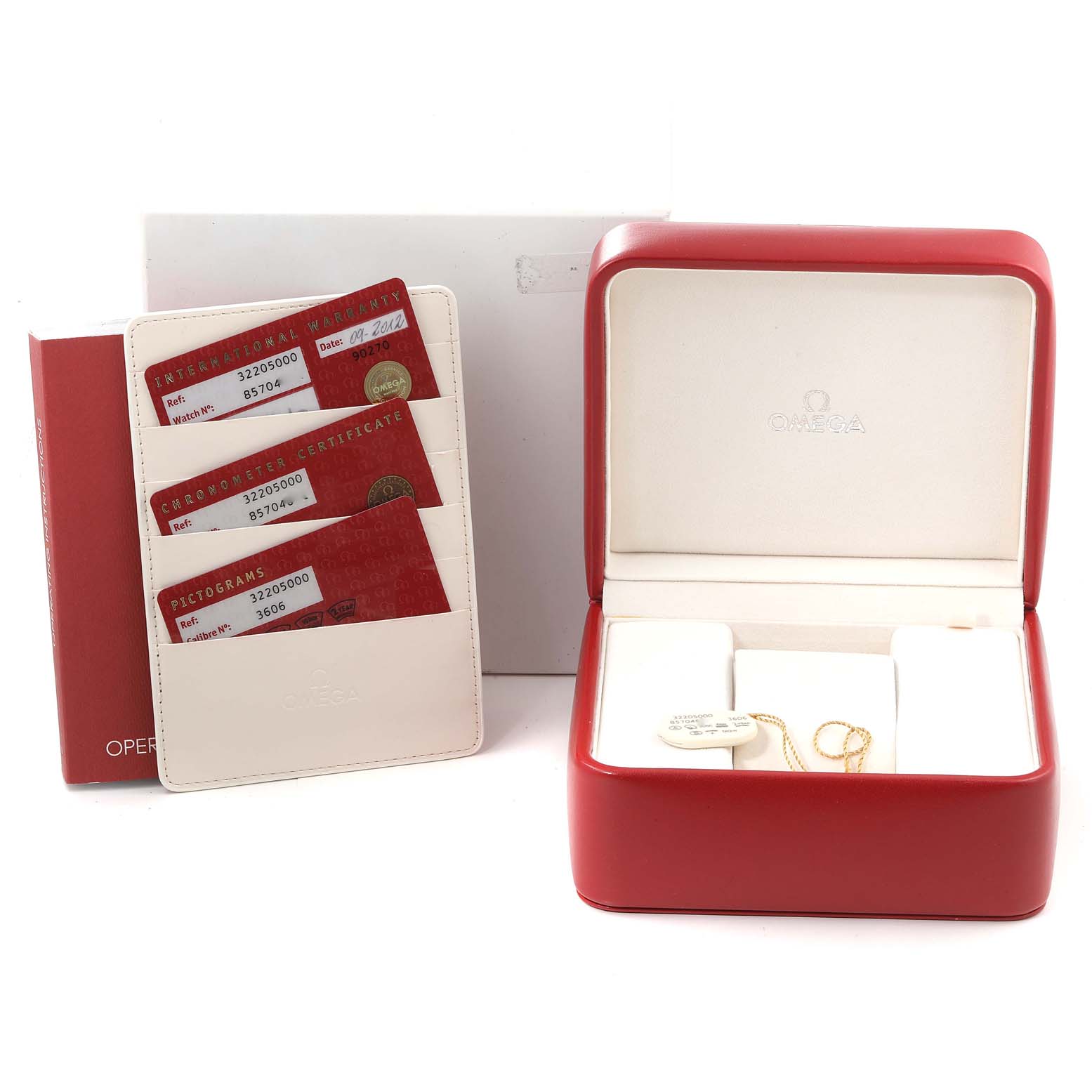 The image shows an Omega Speedmaster 3220.50.00 Men
s Stainless Steel Black Dial 3220.50.00 Men
s Stainless Steel Black Dial watch box, warranty cards in a sleeve, and an empty watch case.