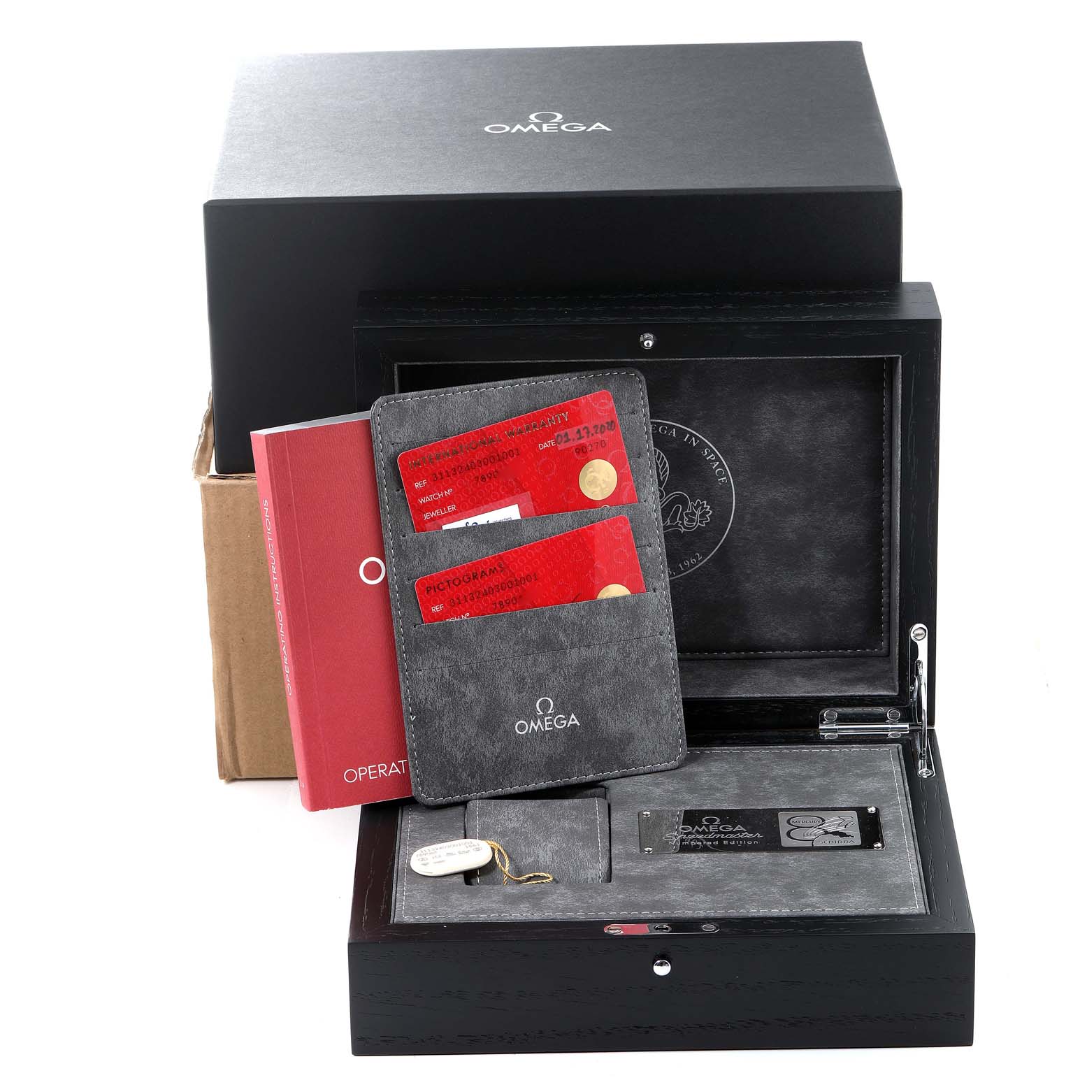 The image shows the Omega Speedmaster 311.32.40.30.01.001 Men's Stainless Steel Black Dial 311.32.40.30.01.001 Men's Stainless Steel Black Dial's packaging with the warranty cards, manual, and accessories displayed.