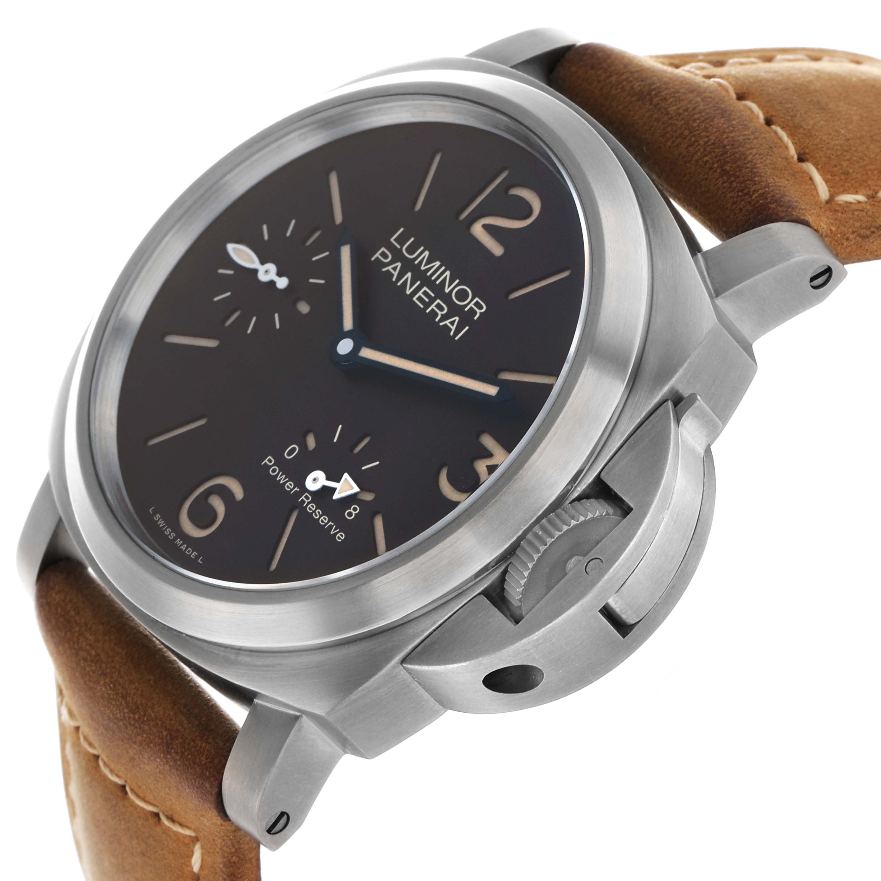 The Panerai Luminor PAM00797 Men's Titanium Brown Dial watch is shown at an angle highlighting the dial, crown guard, and tan leather strap.