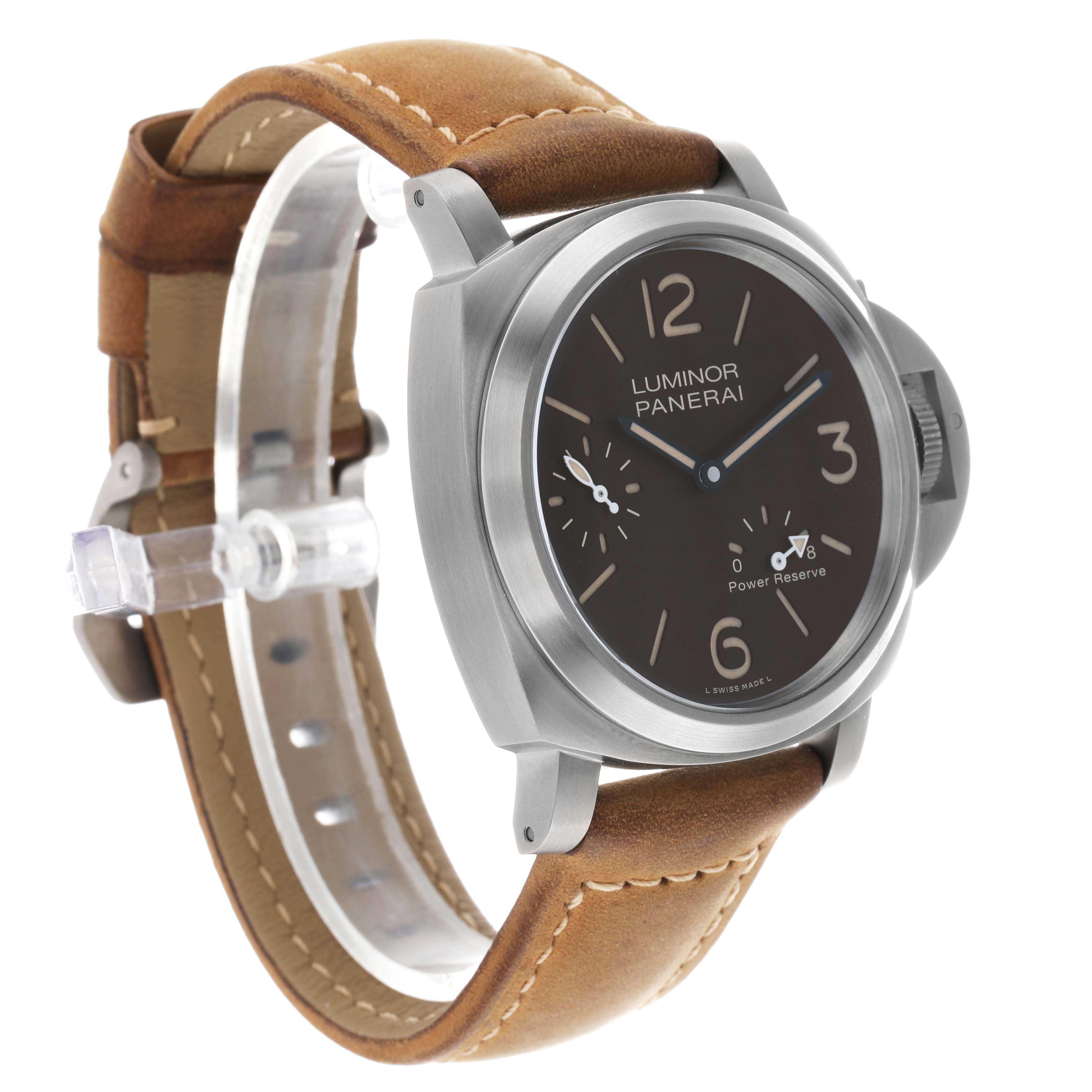 The Panerai Luminor PAM00797 Men's Titanium Brown Dial watch is shown at a three-quarter angle, highlighting the brown dial, case, and tan leather strap.