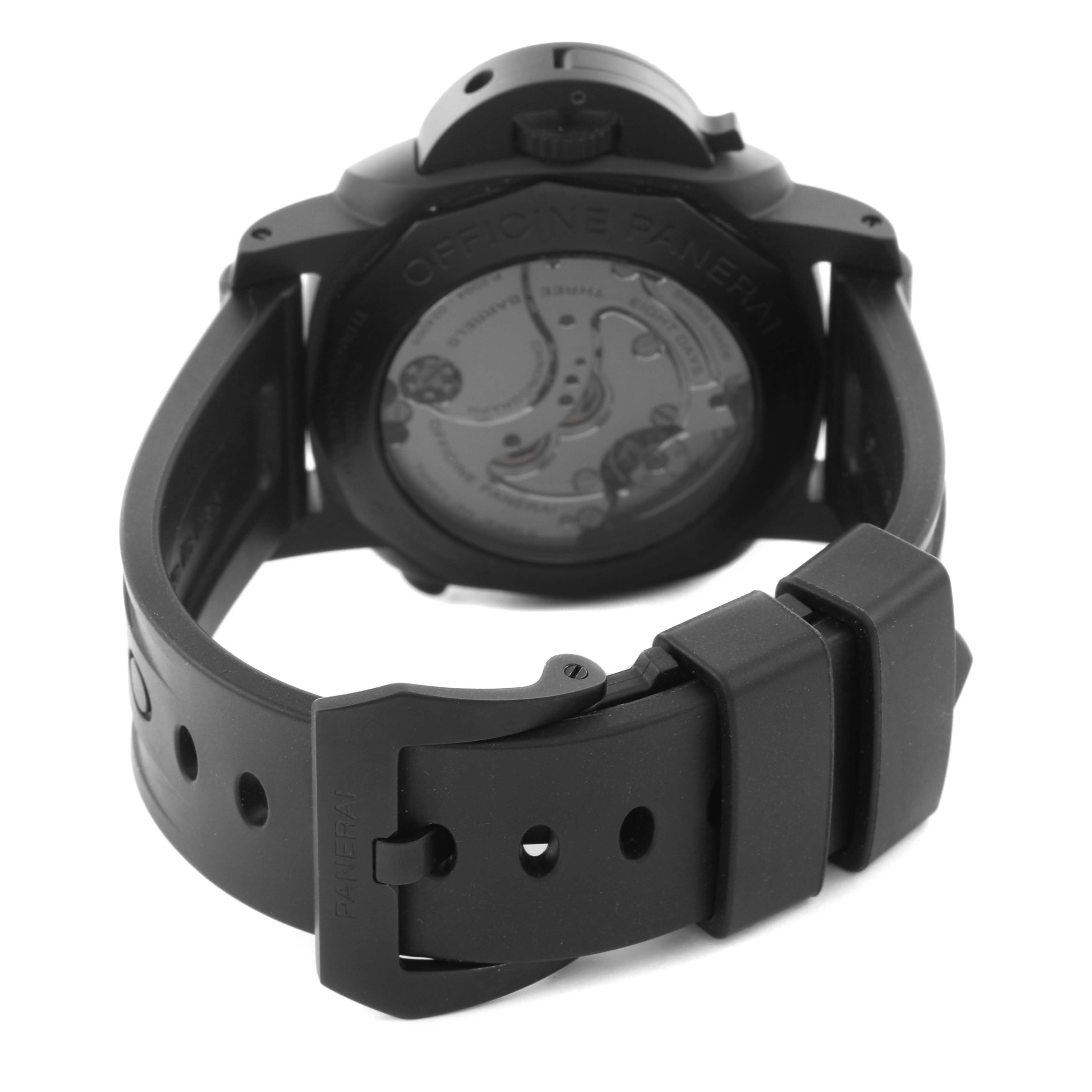 The Luminor Panerai watch is shown from a rear angle, highlighting the case back and rubber strap with a buckle.