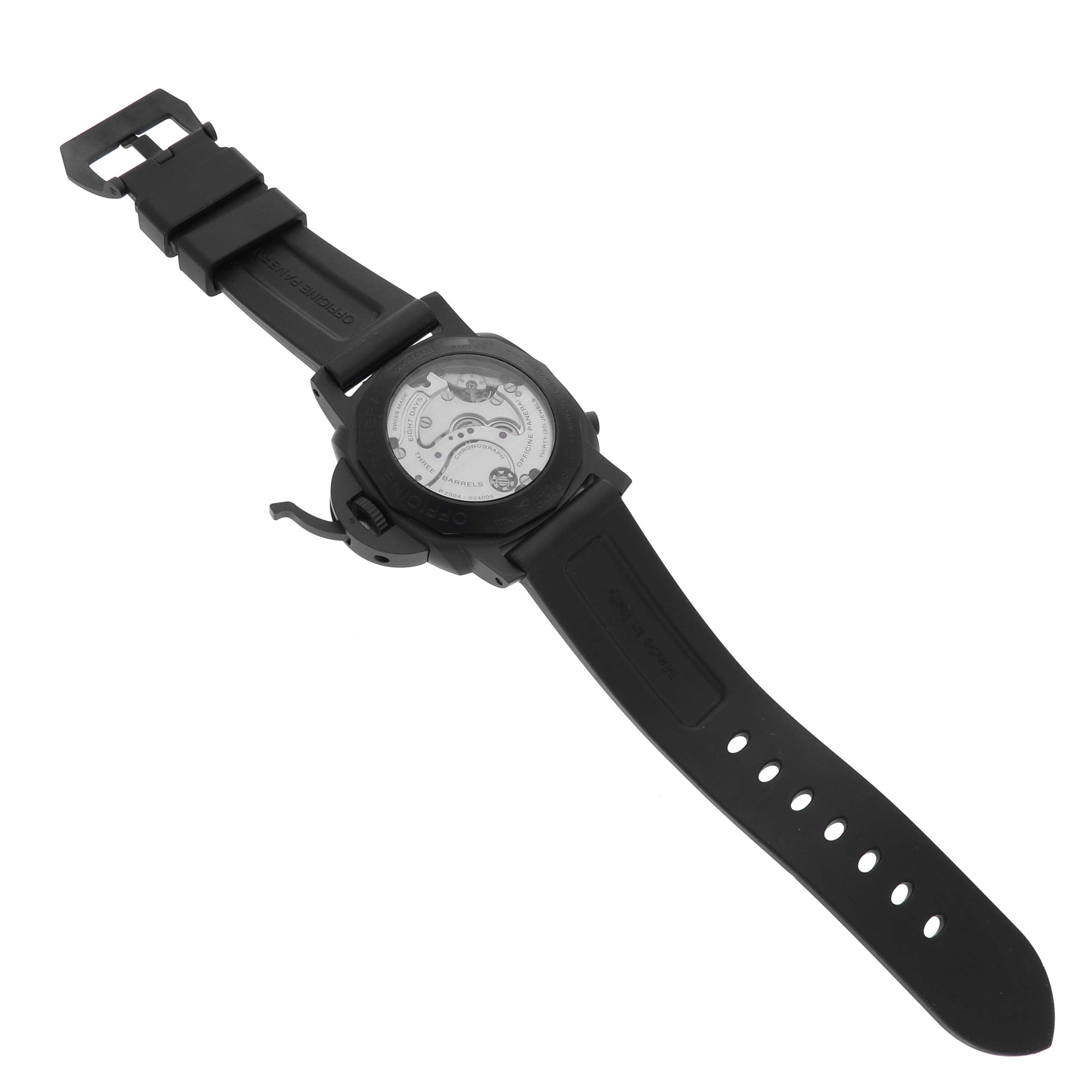 The image shows a Panerai Luminor PAM00317 Men
s Ceramic Black Dial PAM00317 Men
s Ceramic Black Dial watch from the back, highlighting the exhibition case back, rubber strap, and buckle.