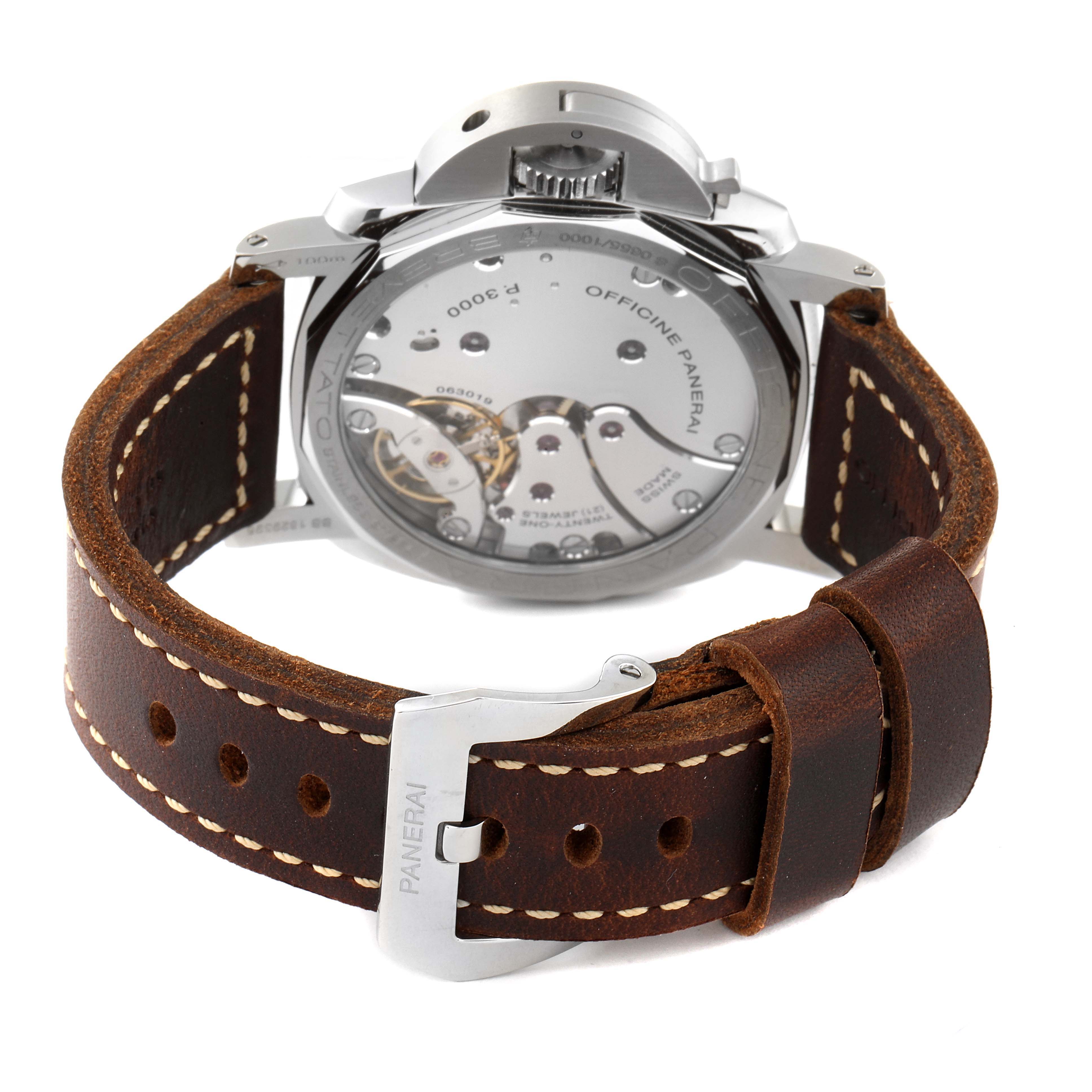 The image shows the back view of a Panerai Luminor PAM00663 Men
s Stainless Steel Brown Dial PAM00663 Men
s Stainless Steel Brown Dial watch, highlighting the movement and leather strap.