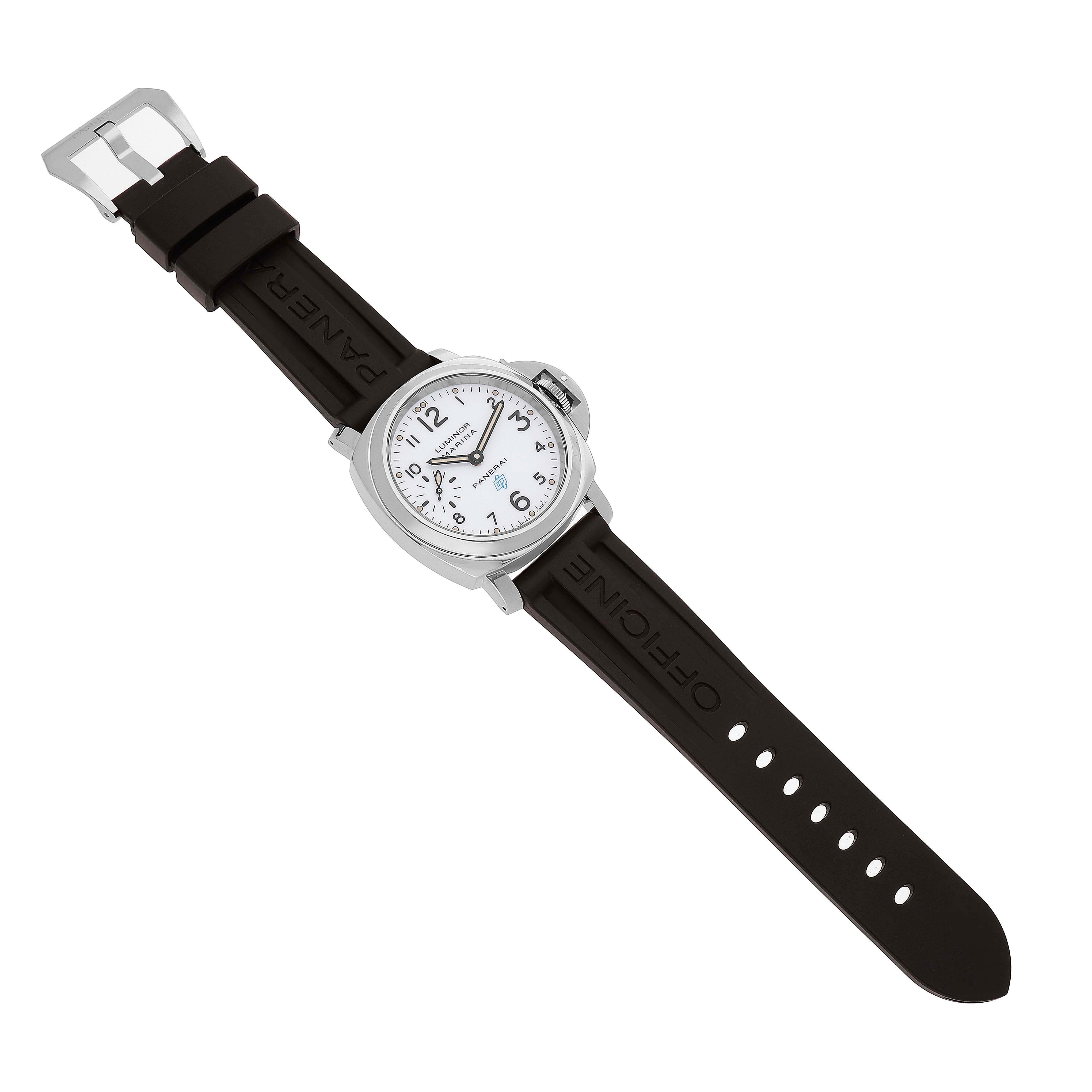 The Panerai Luminor PAM00660 Men's Stainless Steel White Dial watch is shown from an overhead angle, displaying the full face, case, and rubber strap with a clasp.