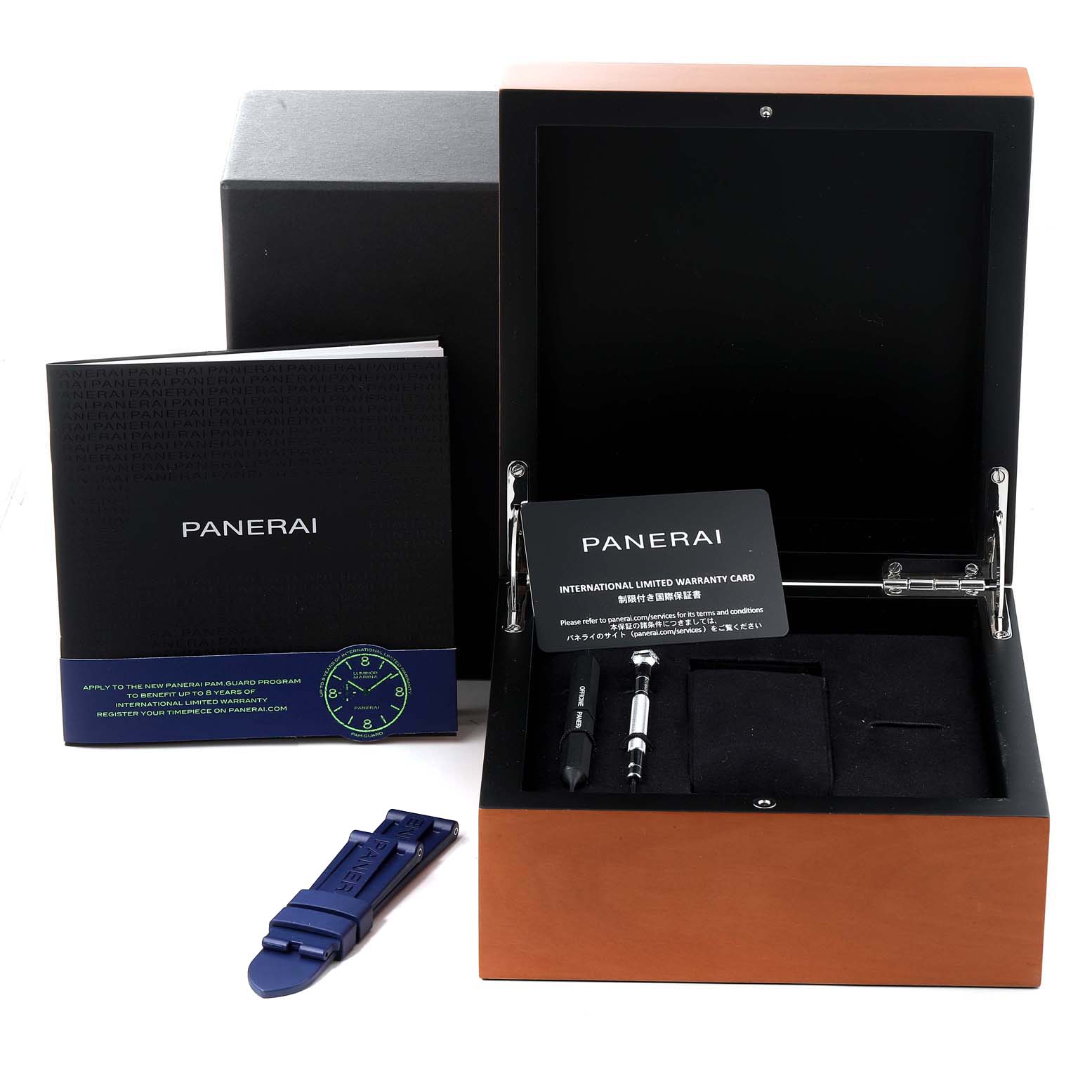 This image shows a Panerai Luminor PAM01313 Men's Stainless Steel Blue Dial PAM01313 Men's Stainless Steel Blue Dial watch box with accessories, including a booklet, tools, a warranty card, and a blue strap.